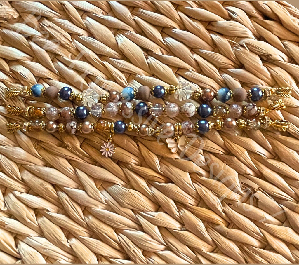 Handmade, custom sized, beaded watch bracelet!  A white butterfly & daisy flower charm, acrylic and glass, gold toned, bail or lobster ends!