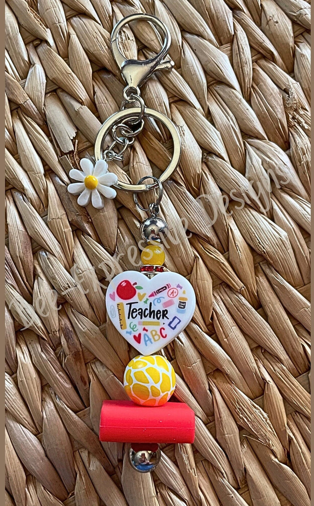 Adorable, TEACHER keychain! Lobster or swivel clasp, book, yellow animal print bead, and a silicone focal heart bead, daisy charm!