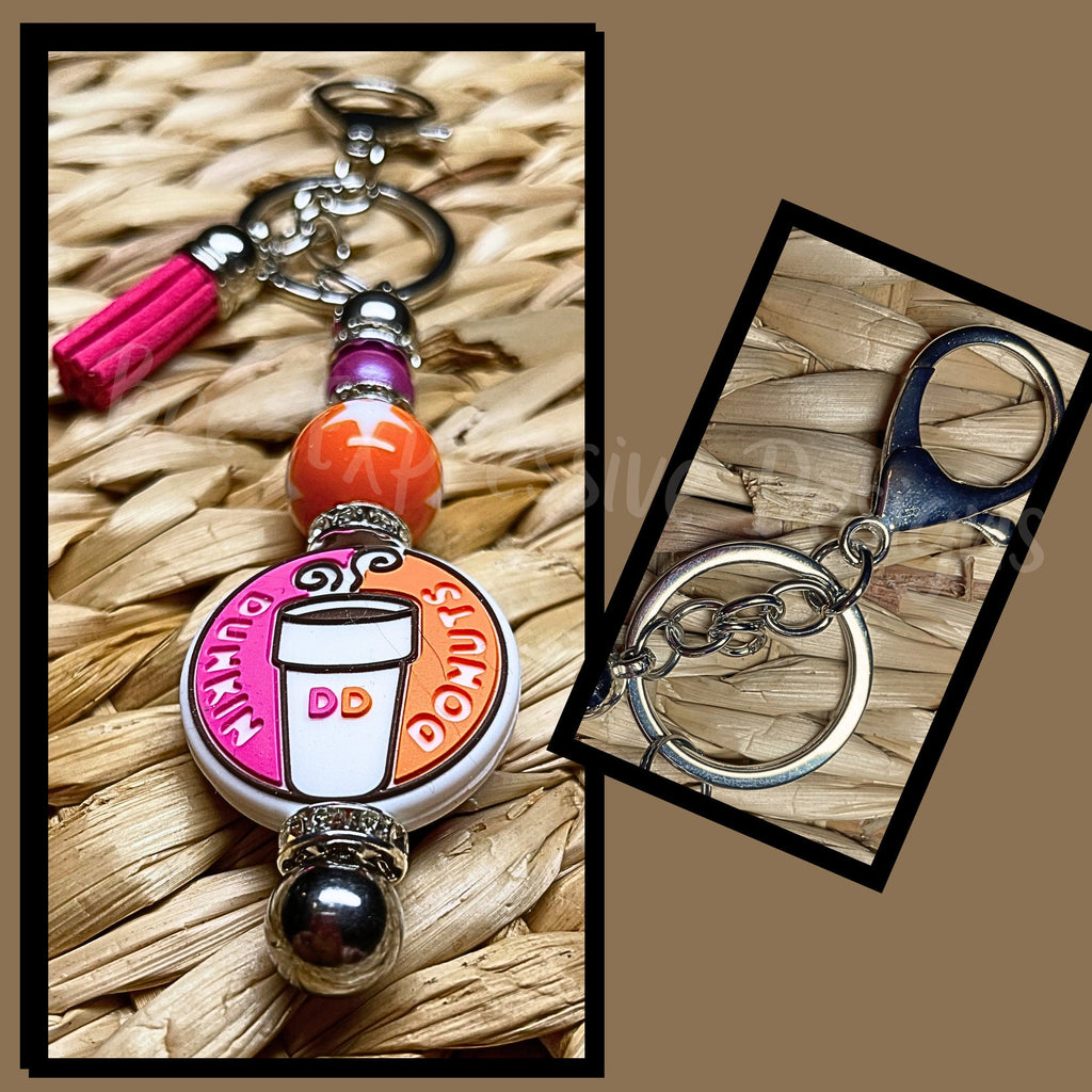 DD Donut inspired keychain! Handmade, lobster or swivel clasp, rhinestone spacers, orange acrylic star bead, a wood bead, suede tassel!