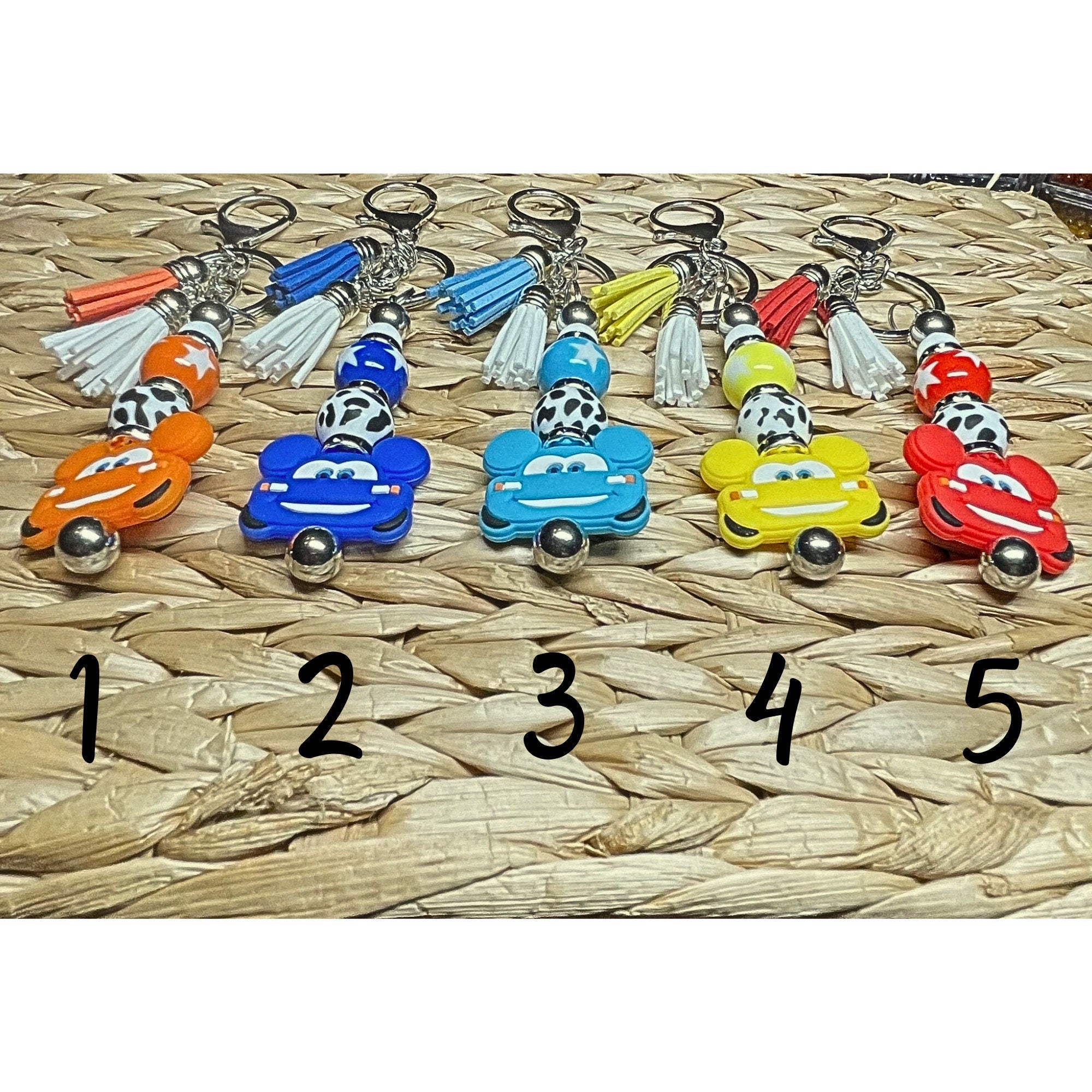 Cute colorful, handmade cars keychains! Lobster claw clasp, beaded bar, acrylic bead & stars, black silicone cow print bead, pick your color