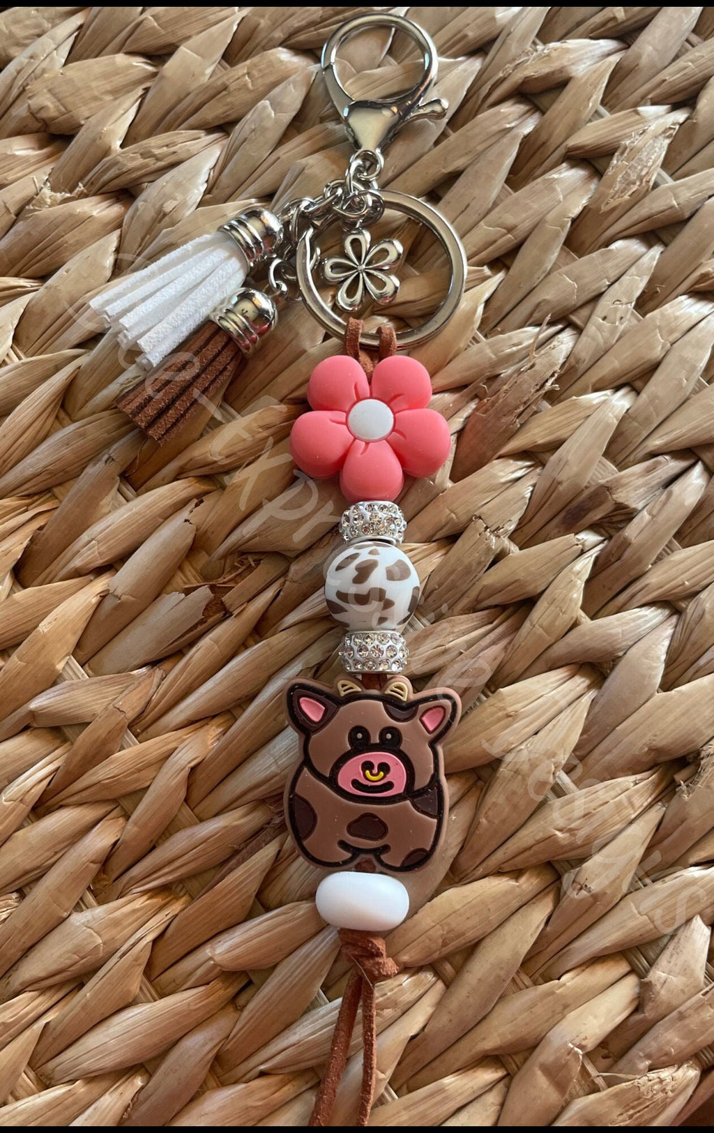 Adorable, handmade cow/bull keychain! Lobster claw clasp, keyring, cord, rhinestones, flower, brown cow print bead, tassels, flower charm