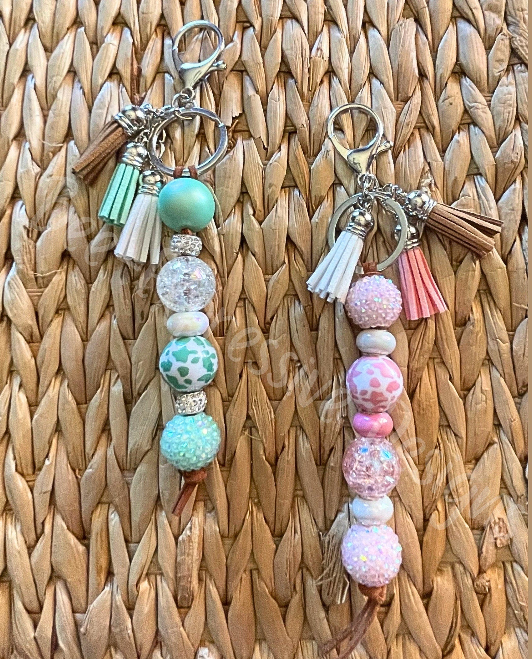 Beautiful, handmade, animal print keychains!  Made with acrylic chunky beads, lobster clasp, rhinestones, three color coordinating tassels!