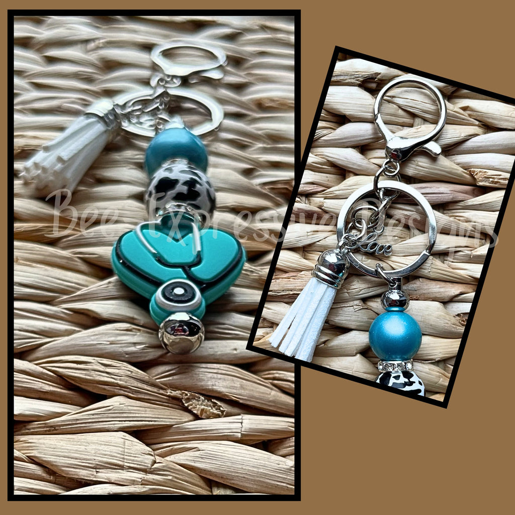 Handmade and unique, medical physician, heart, stethoscope keychain!  Lobster claw clasp, animal print bead, rhinestone spacers, love charm