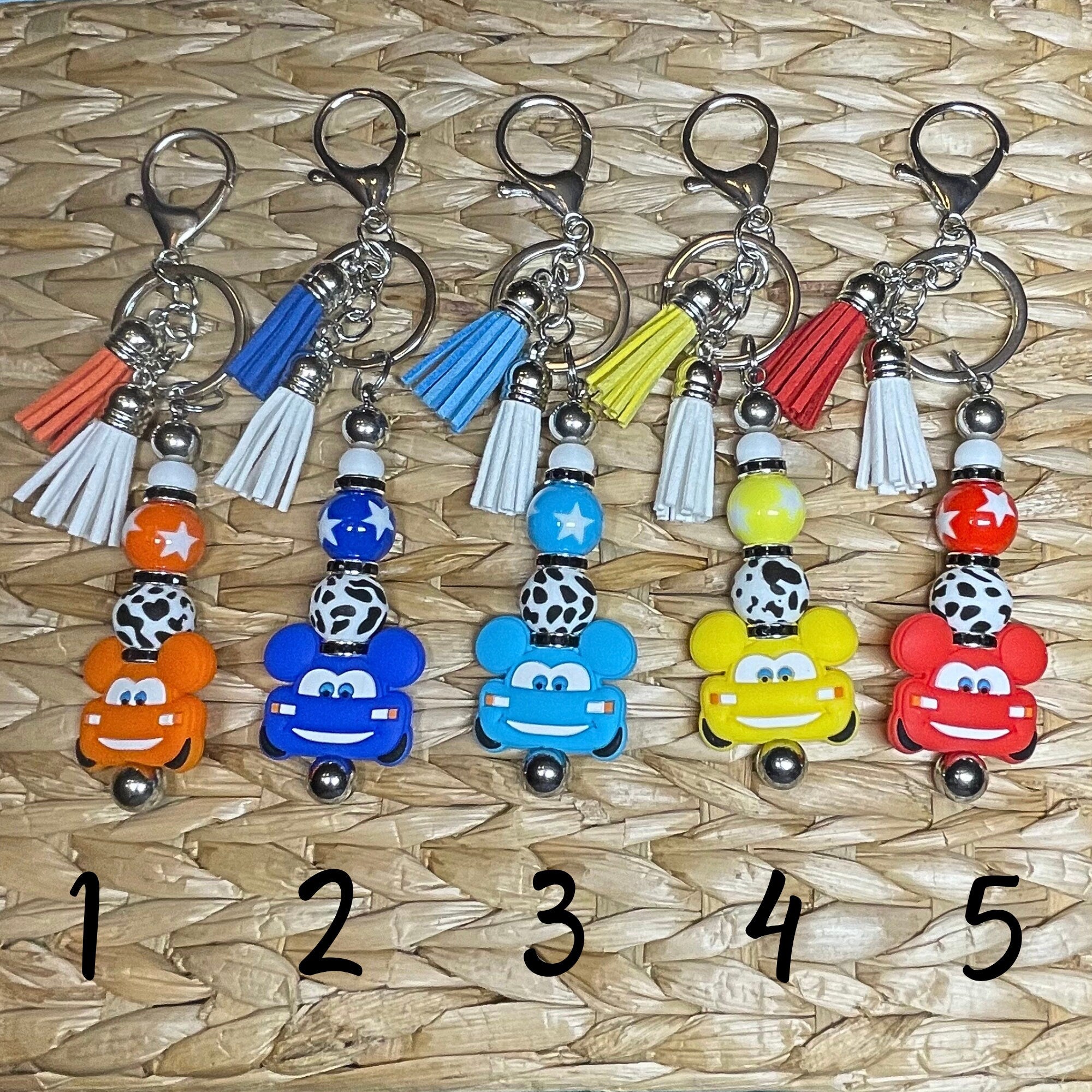 Cute colorful, handmade cars keychains! Lobster claw clasp, beaded bar, acrylic bead & stars, black silicone cow print bead, pick your color