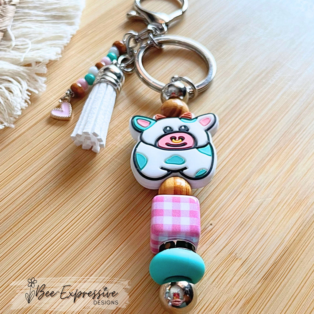 COW, BULL, beaded keychain! Lobster or swivel clasp, wood beads, gingham square bead, beaded tassel with pink heart charm!