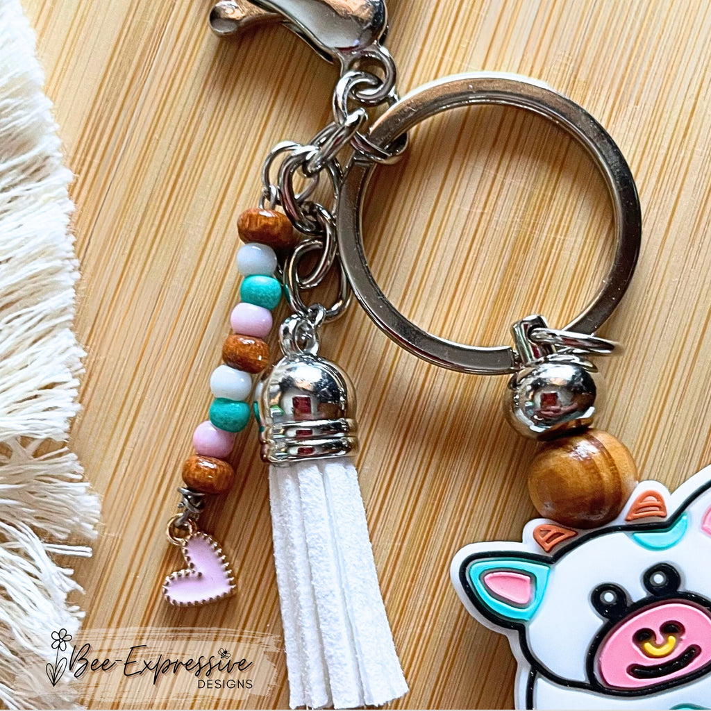 COW, BULL, beaded keychain! Lobster or swivel clasp, wood beads, gingham square bead, beaded tassel with pink heart charm!