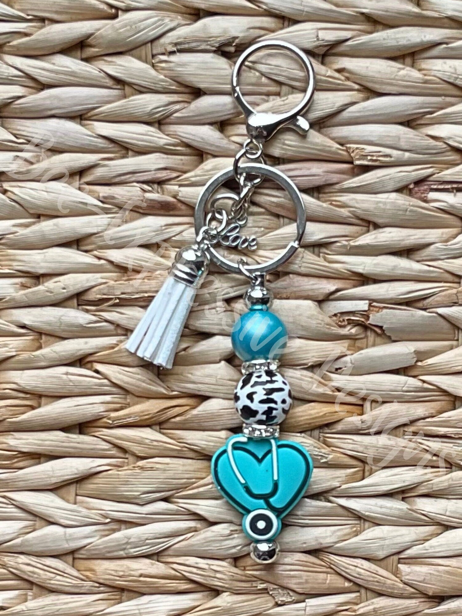 Handmade and unique, medical physician, heart, stethoscope keychain!  Lobster claw clasp, animal print bead, rhinestone spacers, love charm