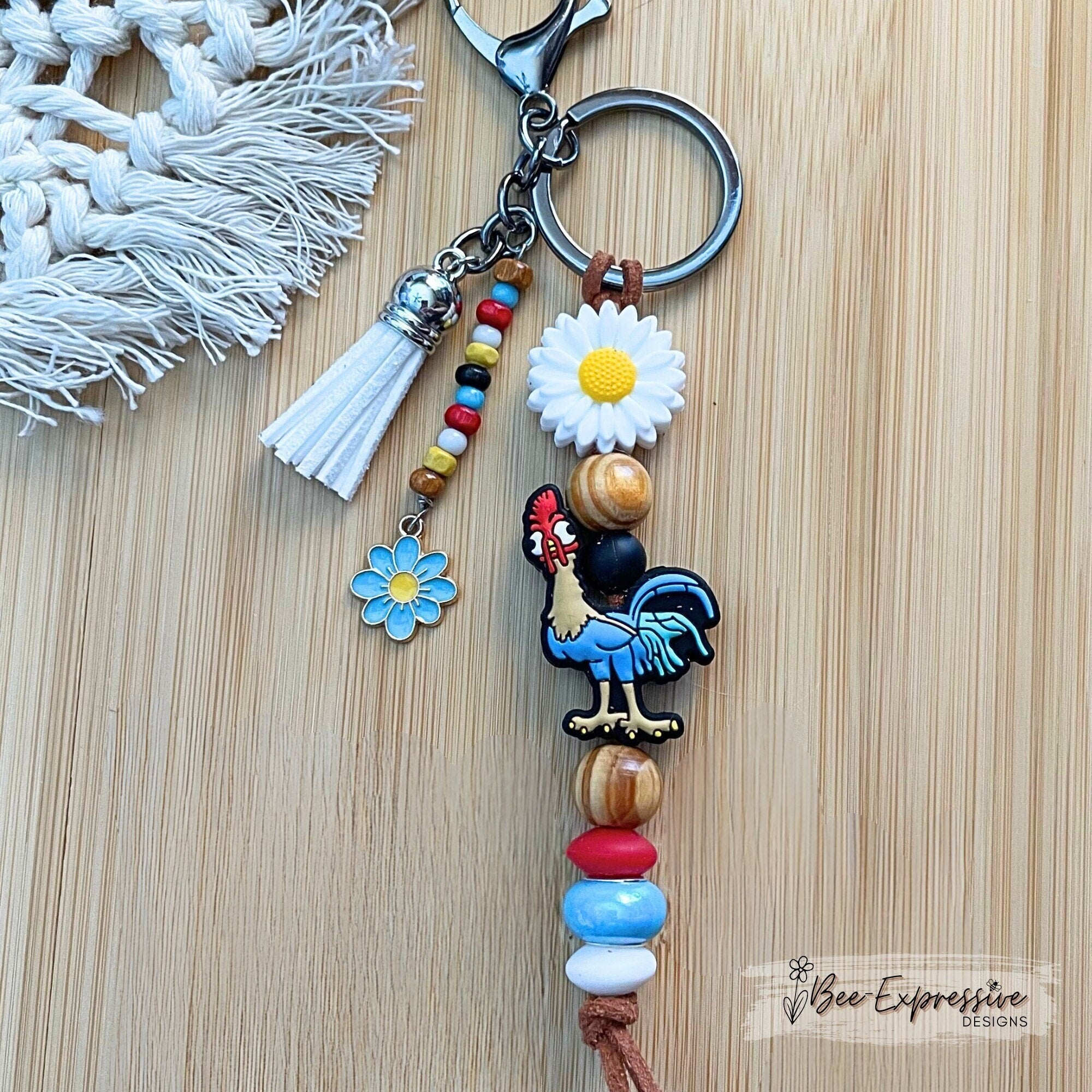Adorable| vividly colored| handmade| silicone chicken| silicone rooster keychain| daisy flowers| beaded tassel| lobster clasp| nylon cord|