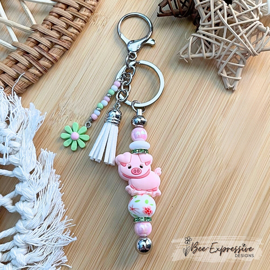 Handmade, beaded, PINK PIG metal keychain! Lobster or swivel clasp, iridescent and silicone beads, rhinestones, beaded tassel, a daisy charm