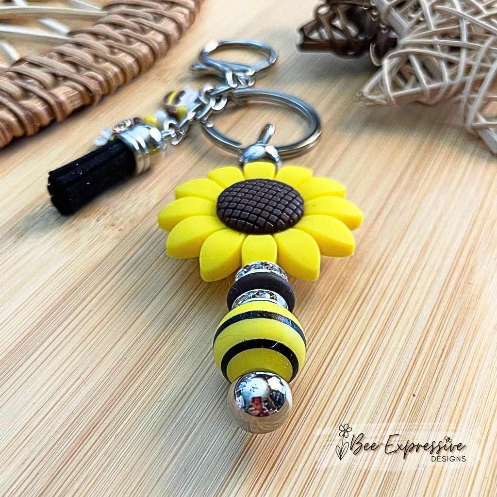 Handmade, beaded, silicone SUNFLOWER keychain! Lobster clasp, bee & a honey pot charm, wood striped bead, beaded tassel, rhinestone spacer