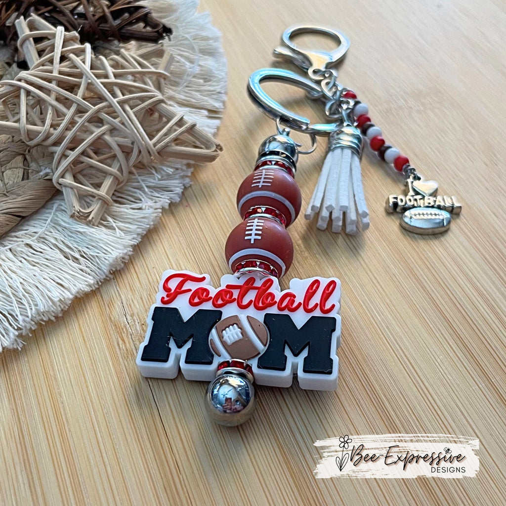 Handmade, FOOTBALL MOM keychain! Lobster claw clasp, rhinestone spacers, silicone footballs, beaded tassel with football charm, customized!