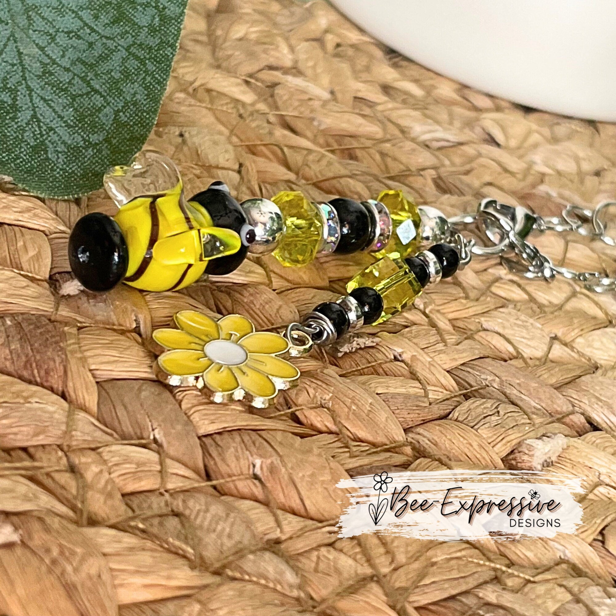 Handmade and fun, tumbler glass bumble bee charm chain! Acrylic beads, rhinestone spacers, beaded tassel with daisy flower charm!