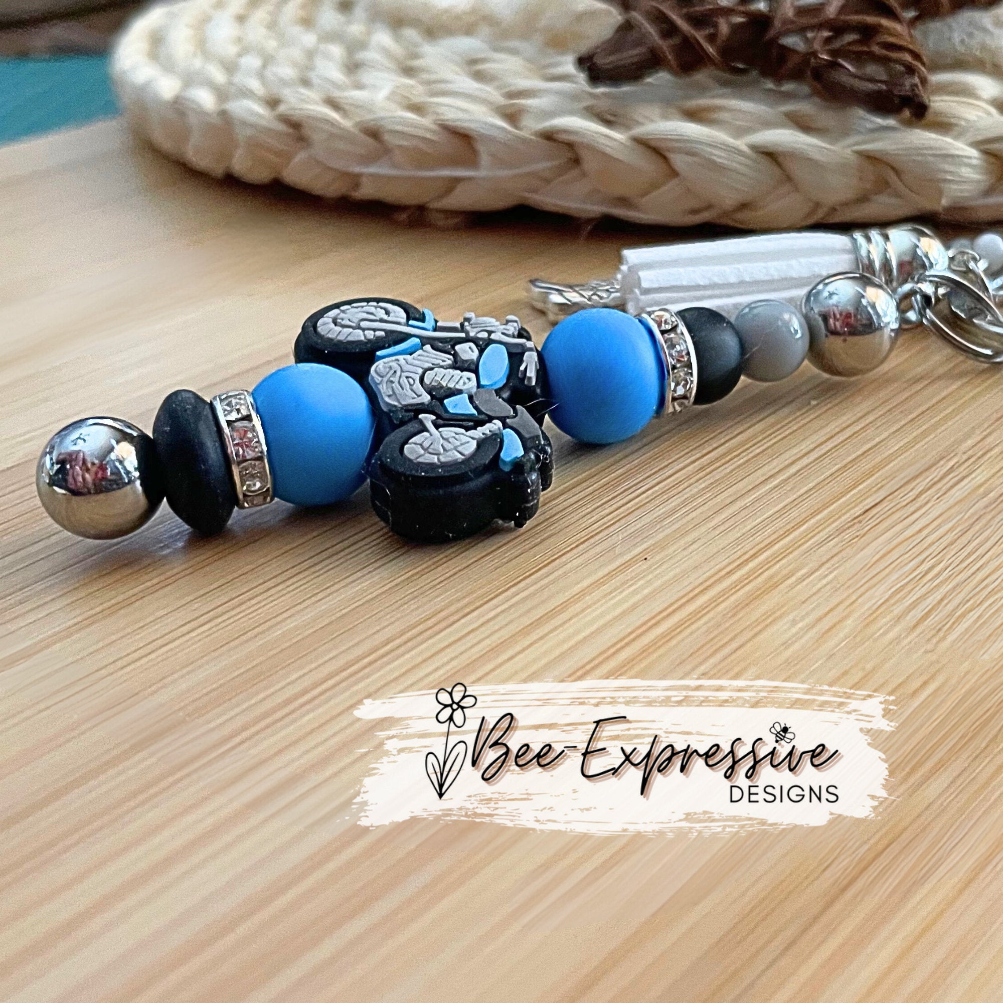 Unique and handmade, blue and gray silicone motorcycle keychain!