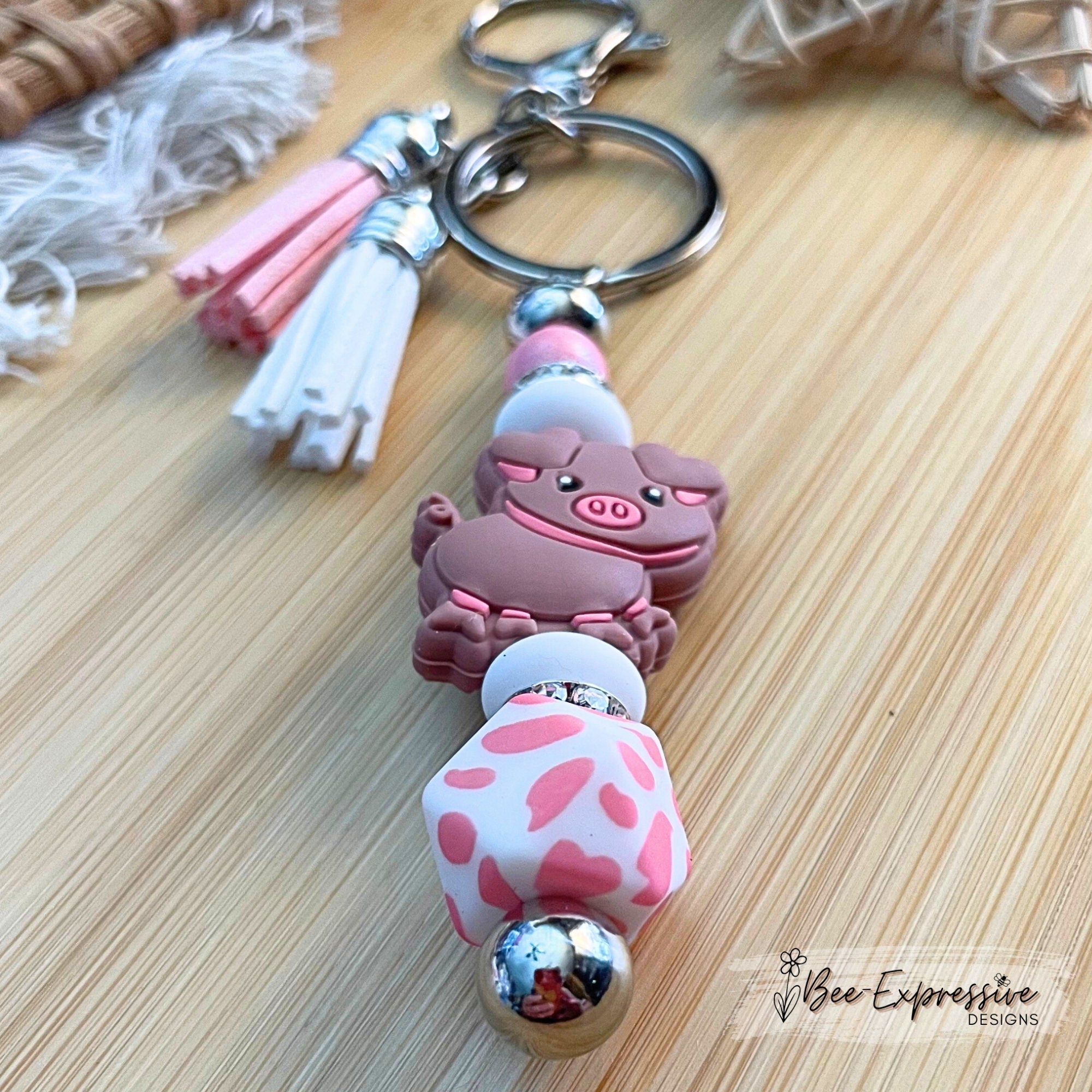 Pink PIG beaded keychain! Lobster or swivel clasp, bead bar, rhinestones, animal print octagon bead, lentils, and 2 tassels