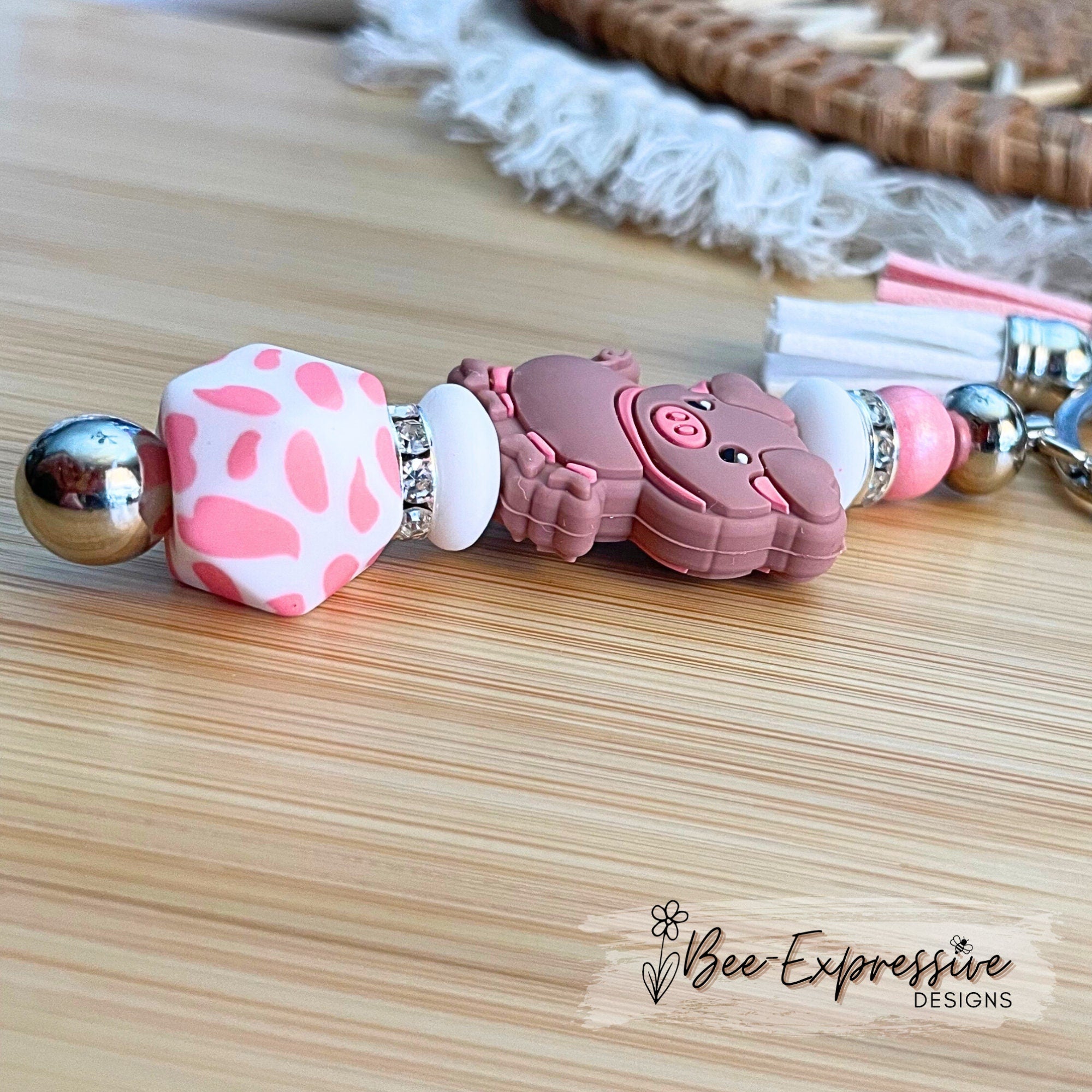 Pink PIG beaded keychain! Lobster or swivel clasp, bead bar, rhinestones, animal print octagon bead, lentils, and 2 tassels
