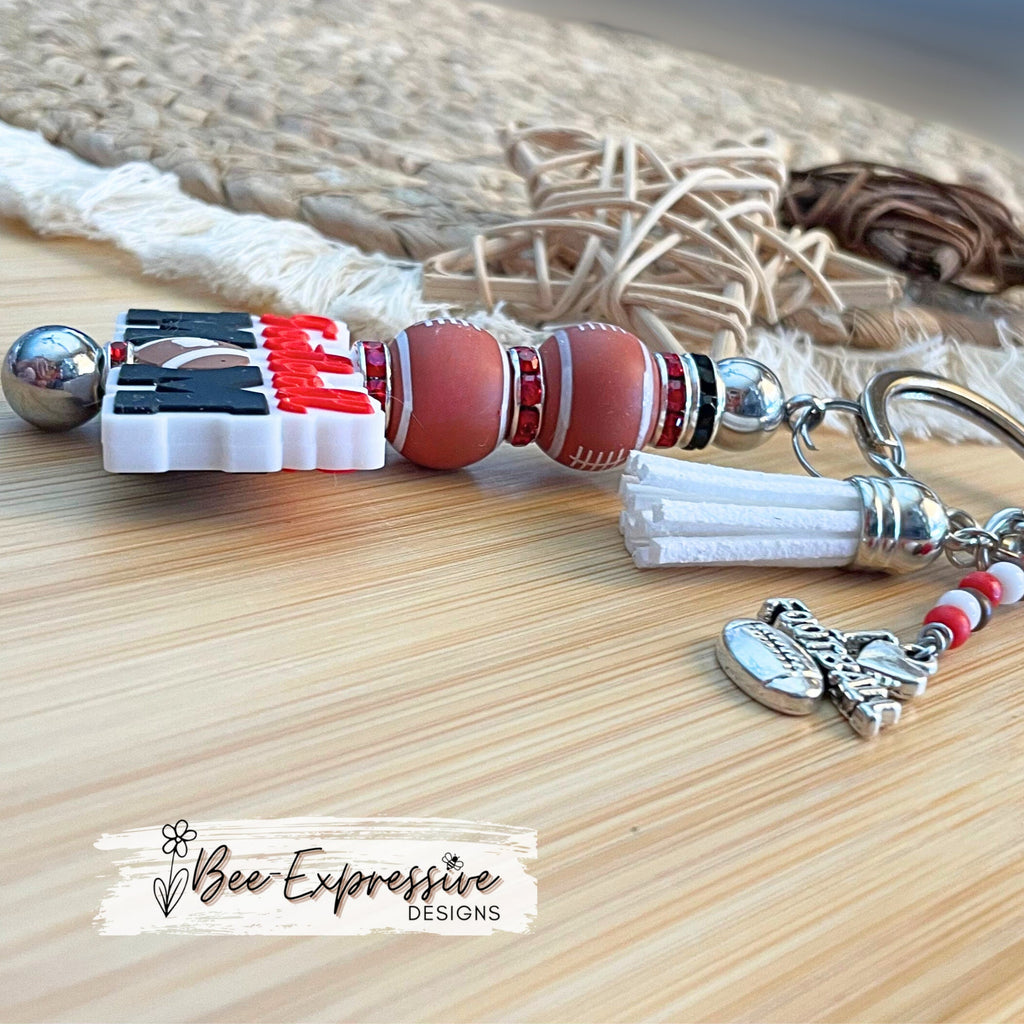 Handmade, FOOTBALL MOM keychain! Lobster claw clasp, rhinestone spacers, silicone footballs, beaded tassel with football charm, customized!