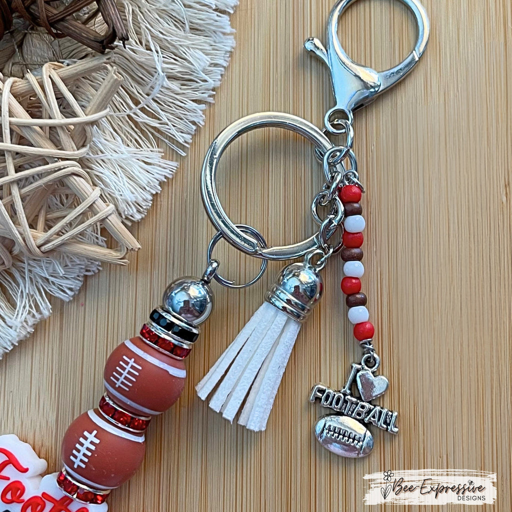 Handmade, FOOTBALL MOM keychain! Lobster claw clasp, rhinestone spacers, silicone footballs, beaded tassel with football charm, customized!