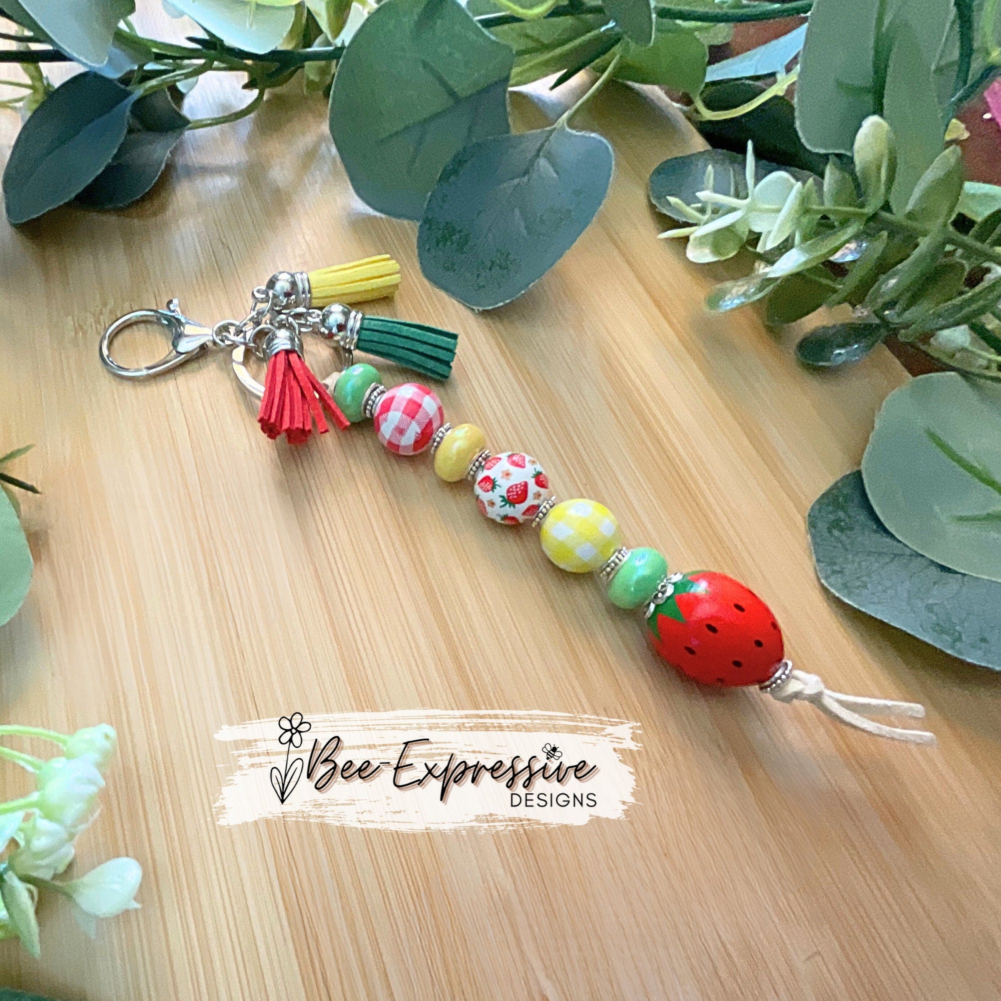 HANDMADE, unique, beaded strawberry keychain! Lobster clasp, suede cord, acrylic rondelle spacer beads, gingham beads, tassels, wood beads