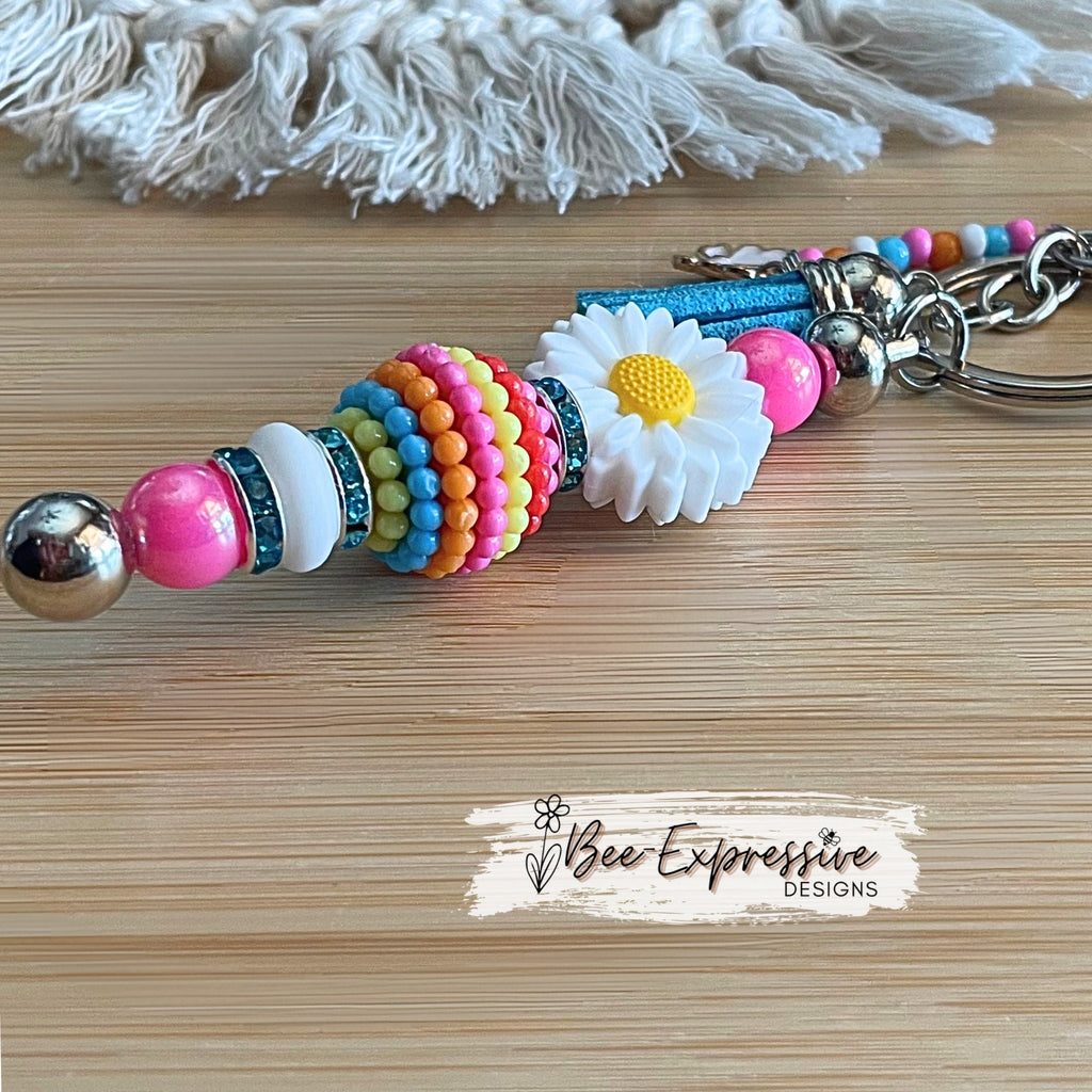 Beaded, white daisy keychain! Lobster or swivel clasp, rhinestones spacers, pink iridescent beads, bayberry bead, white butterfly charm!