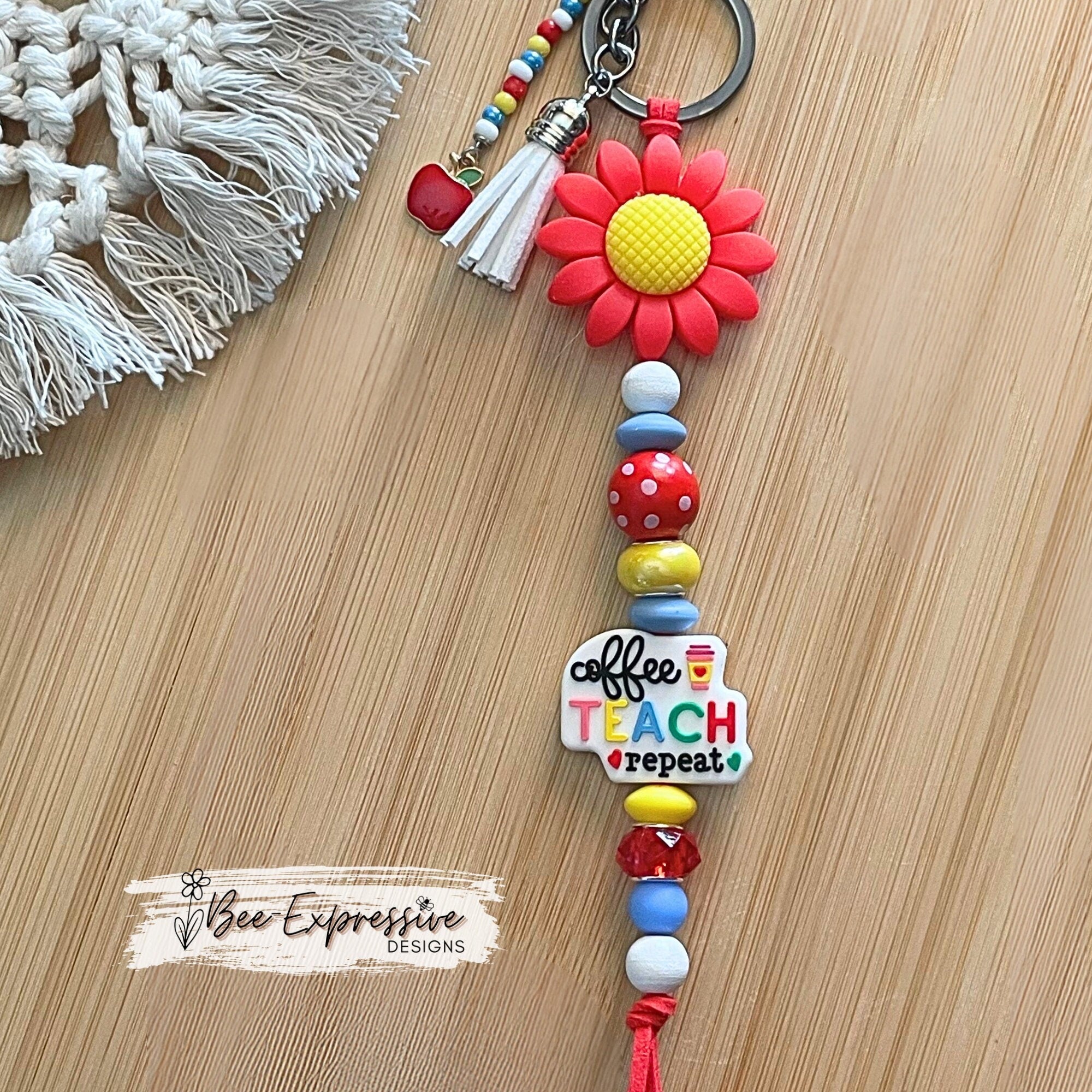 Handmade, cute, TEACHER keychain! Lobster or swivel clasp, red suede cord, daisy flower bead, beaded tassel with an apple charm pendant