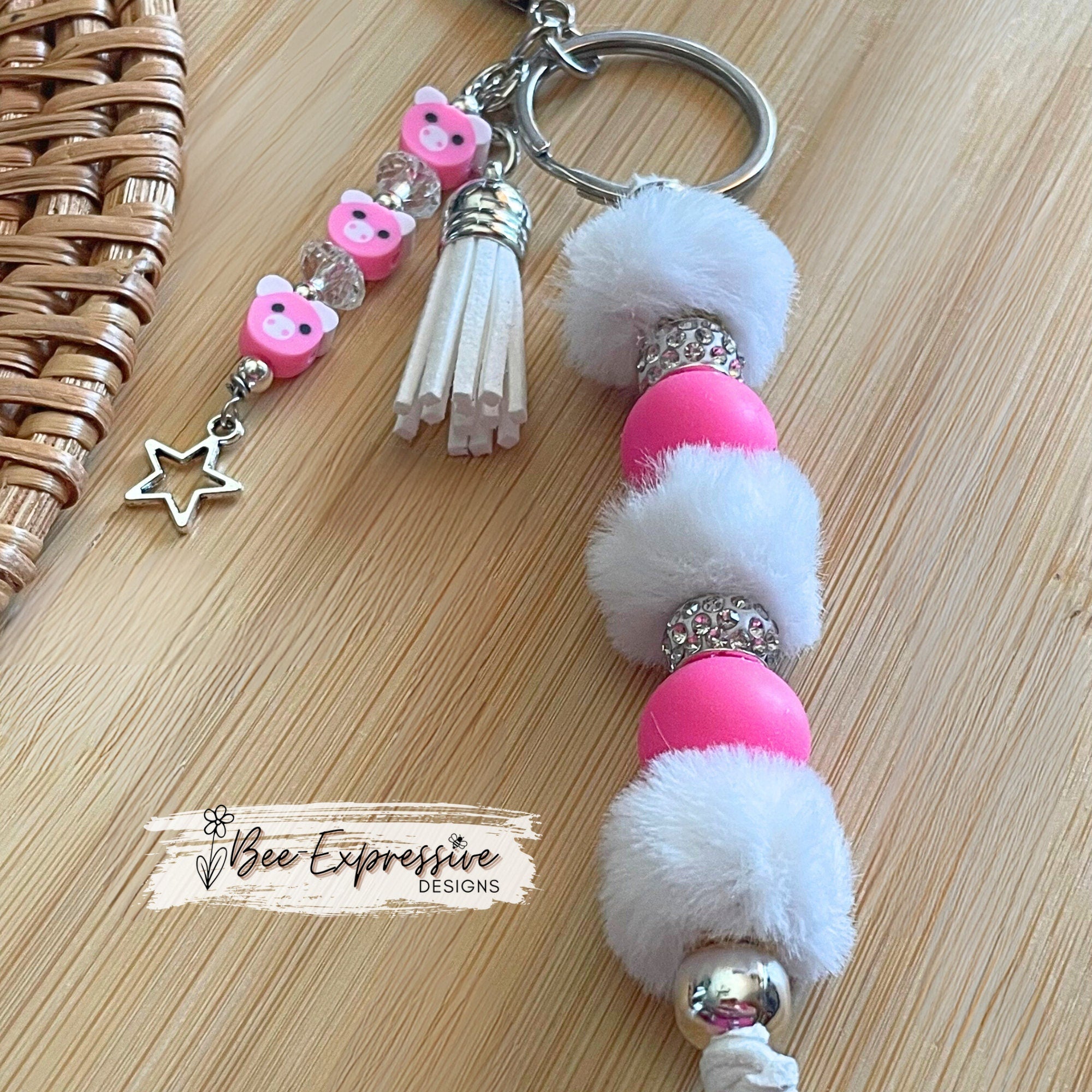 Adorable, handmade, pig keychain! Lobster claw clasp, rhinestones, hot pink round silicone beads, furry beads and a pig beaded tassel!