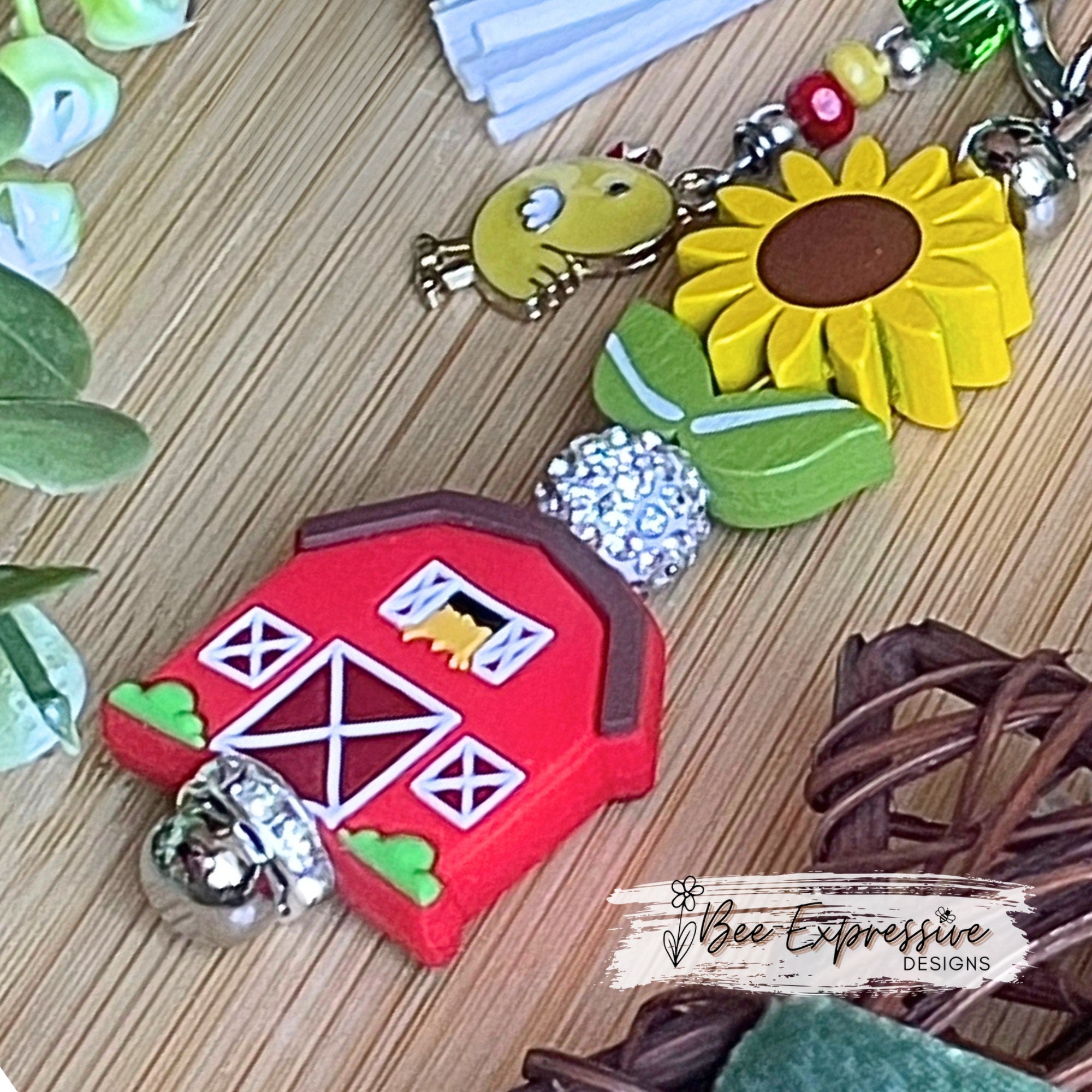 Handmade, vividly colored, farm barn keychain!  Lobster clasp, wood sunflower, silicone barn, beaded tassel with chicken charm, rhinestone