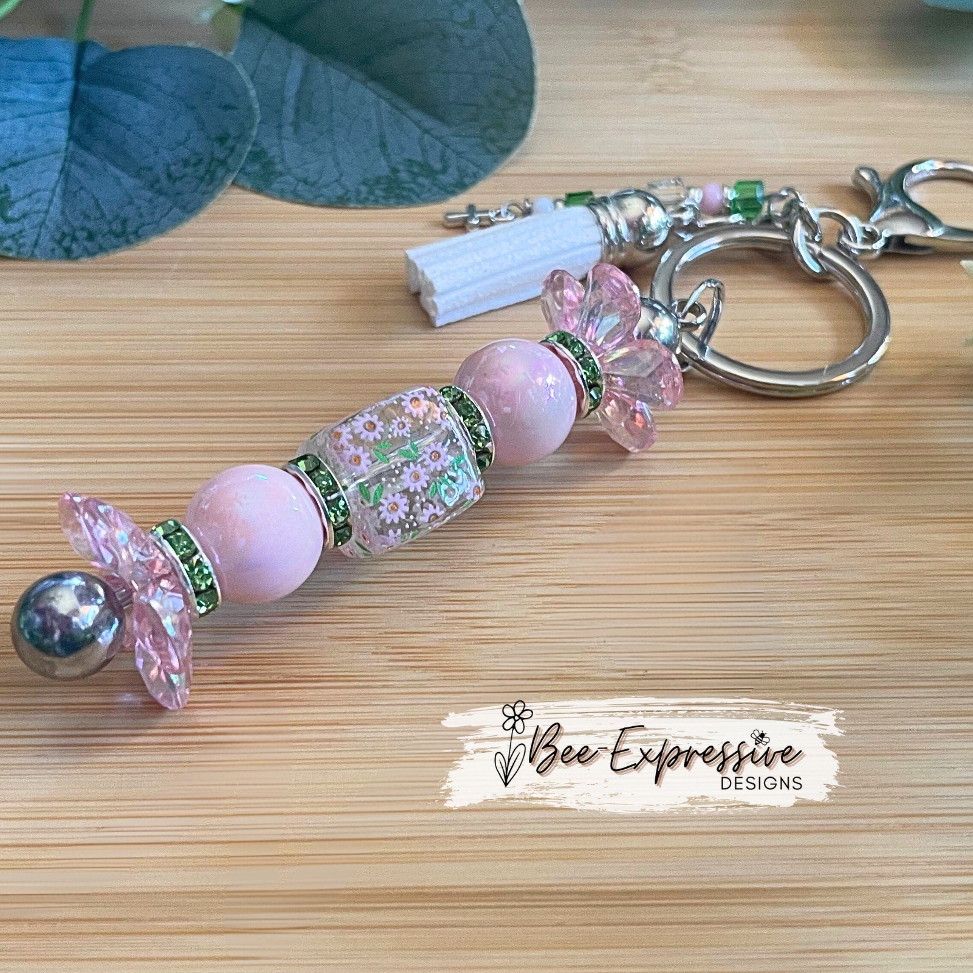 Beautiful, handmade keychain with iridescent pink & green beads! Lobster claw, alloy keychain, acrylic beads, beaded tassel with cross charm