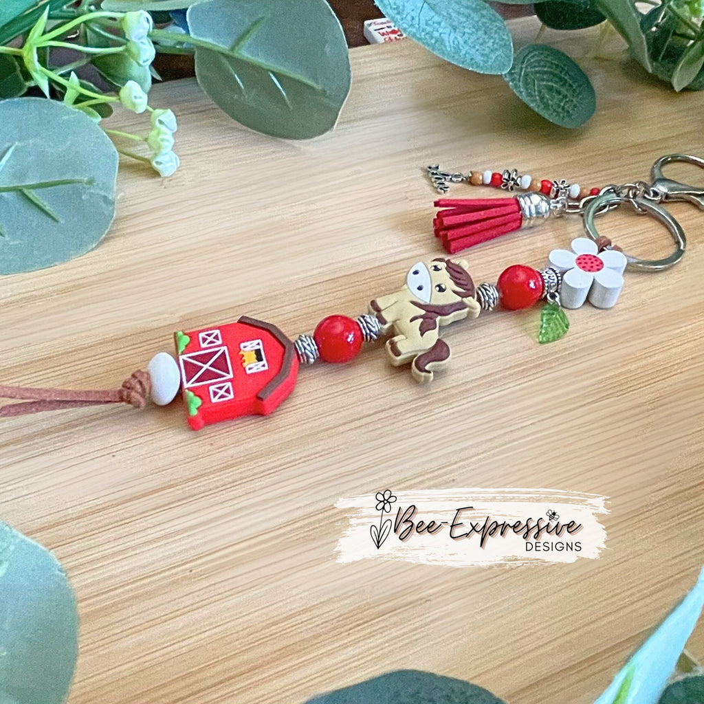 Daisy, red barn, & horse keychain! Lobster or swivel clasp, wood daisy flower, suede cord, metal flower beads, beaded tassel, LOVE charm!