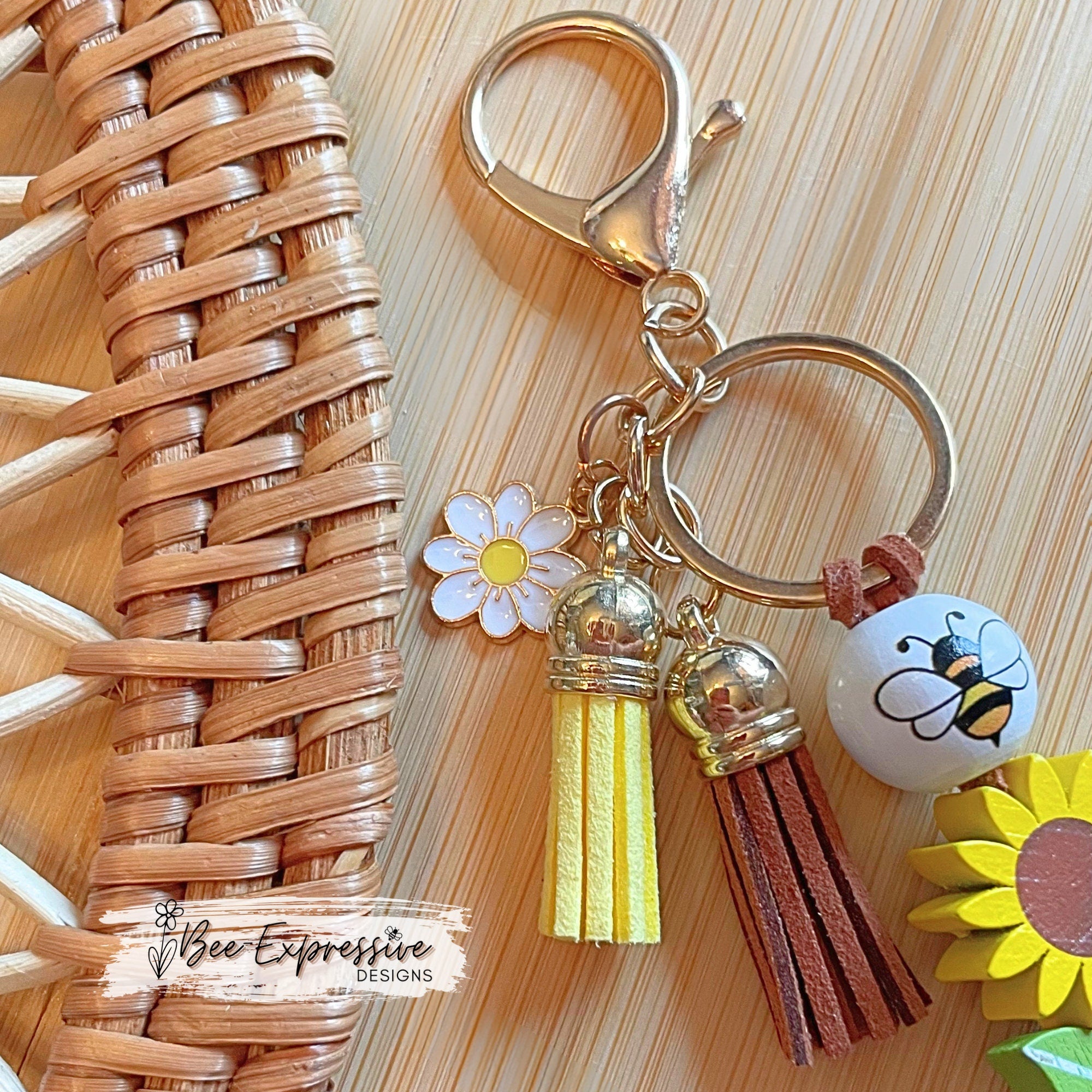 Handmade, adorable, honey bear bumble bee keychain! Lobster claw, corded, wood sunflower, bee bead, daisy charm pendant, tassels