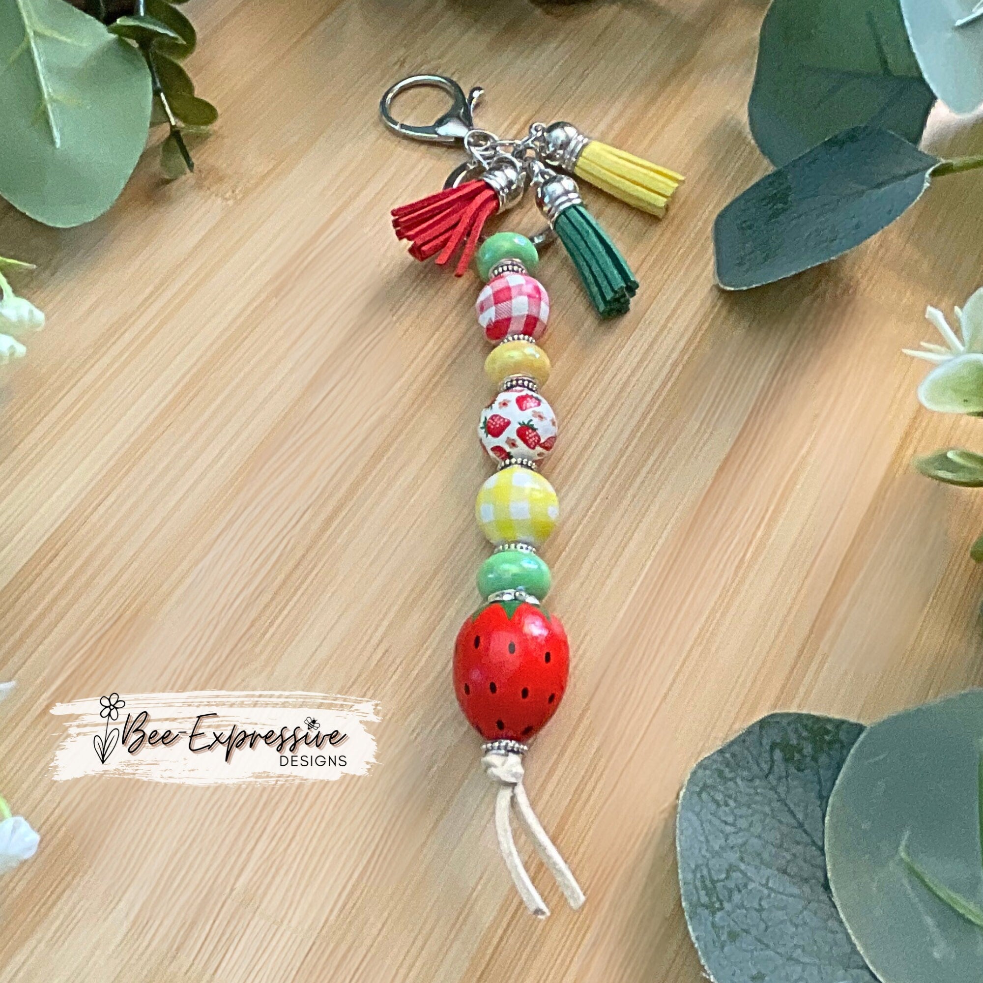HANDMADE, unique, beaded strawberry keychain! Lobster clasp, suede cord, acrylic rondelle spacer beads, gingham beads, tassels, wood beads
