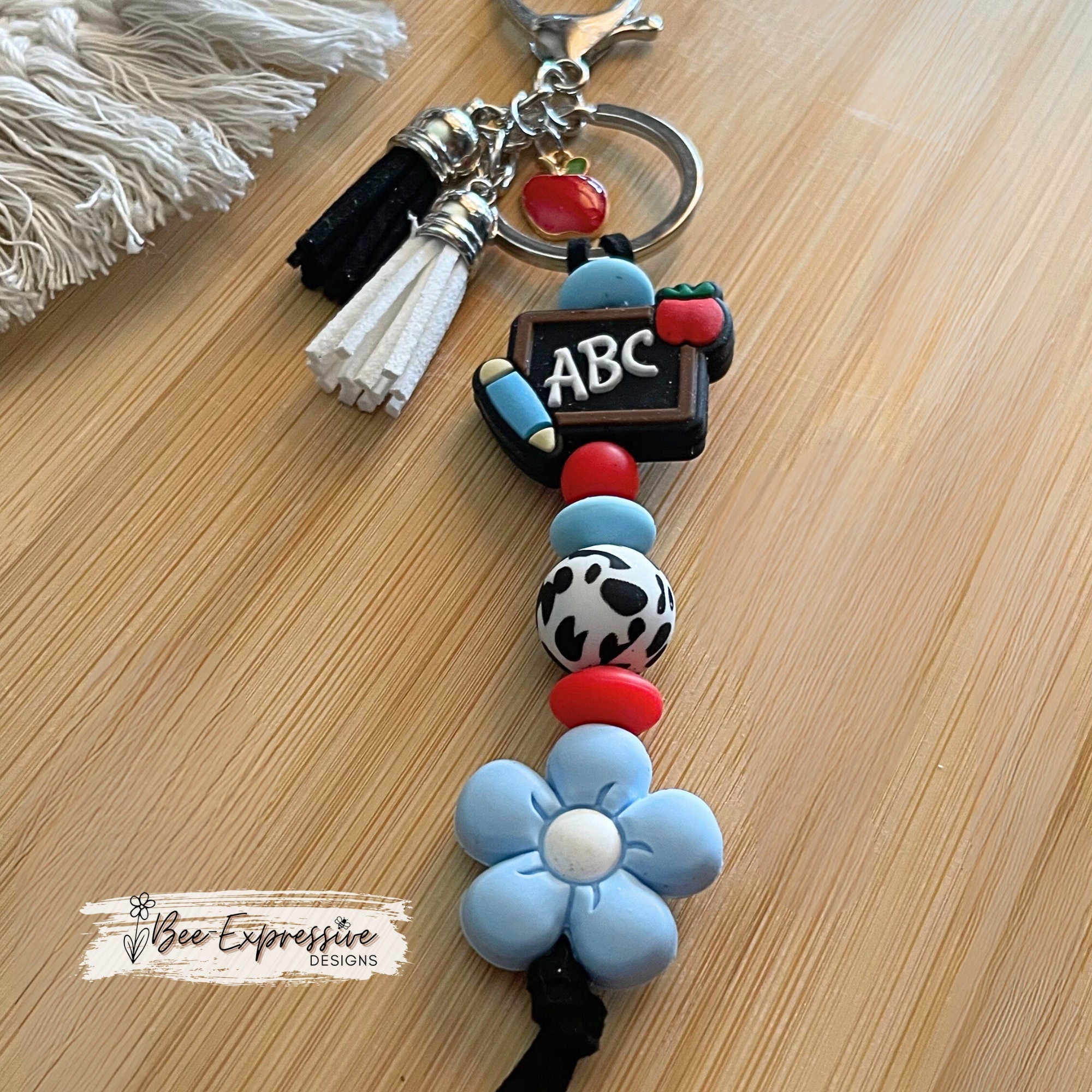 Handmade, cute, TEACHER keychain! Lobster claw clasp, black suede cord, silicone ABC chalkboard and daisy flower, an apple charm pendant!