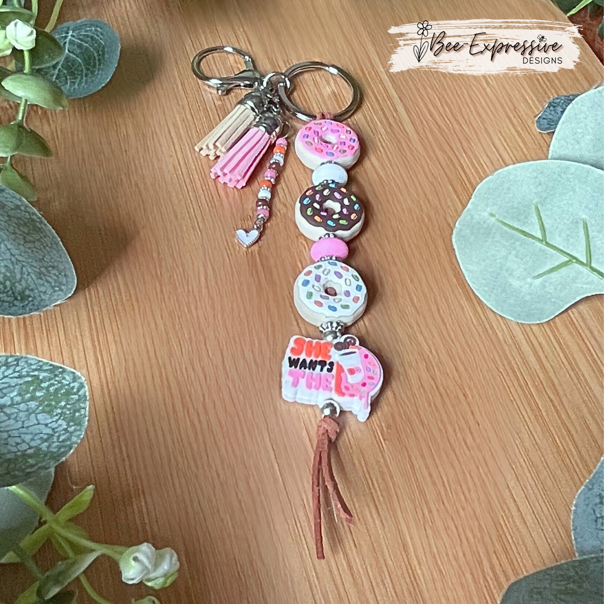 Handmade, DD donut inspired keychain! Lobster or swivel clasp, suede cord, silicone donut beads, beaded tassel with a heart charm!