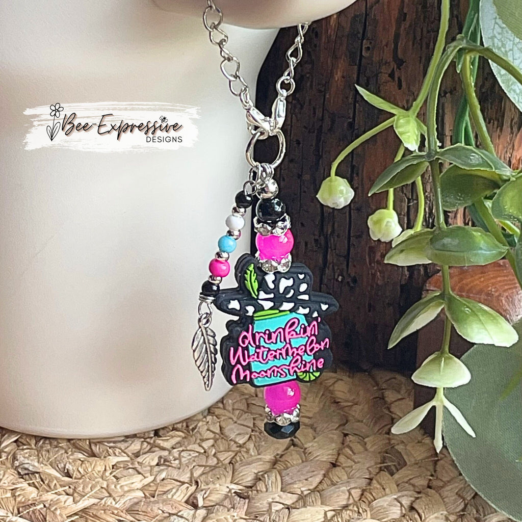 Handmade, unique, and colorful! Lainey watermelon moonshine tumbler charm chain! Lobster claw clasps, acrylic beaded tassel with leaf charm!