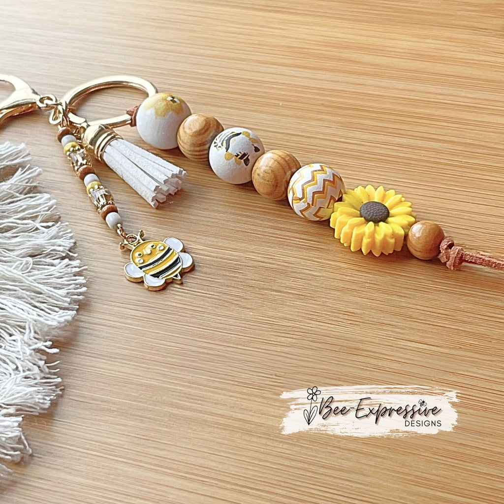 Adorable, handmade BEE gnome keychain! Lobster claw clasp, suede cord, silicone sunflower, printed wood beads, beaded tassel, bee charm!