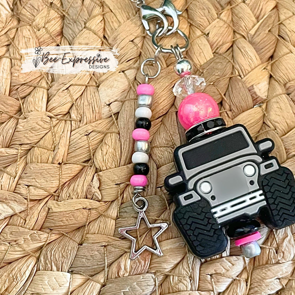 Handmade and fun, a 4x4 vehicle charm chain for tumbler handles!! 2 small lobster claw clasps, acrylic beads, beaded tassel, a star charm!