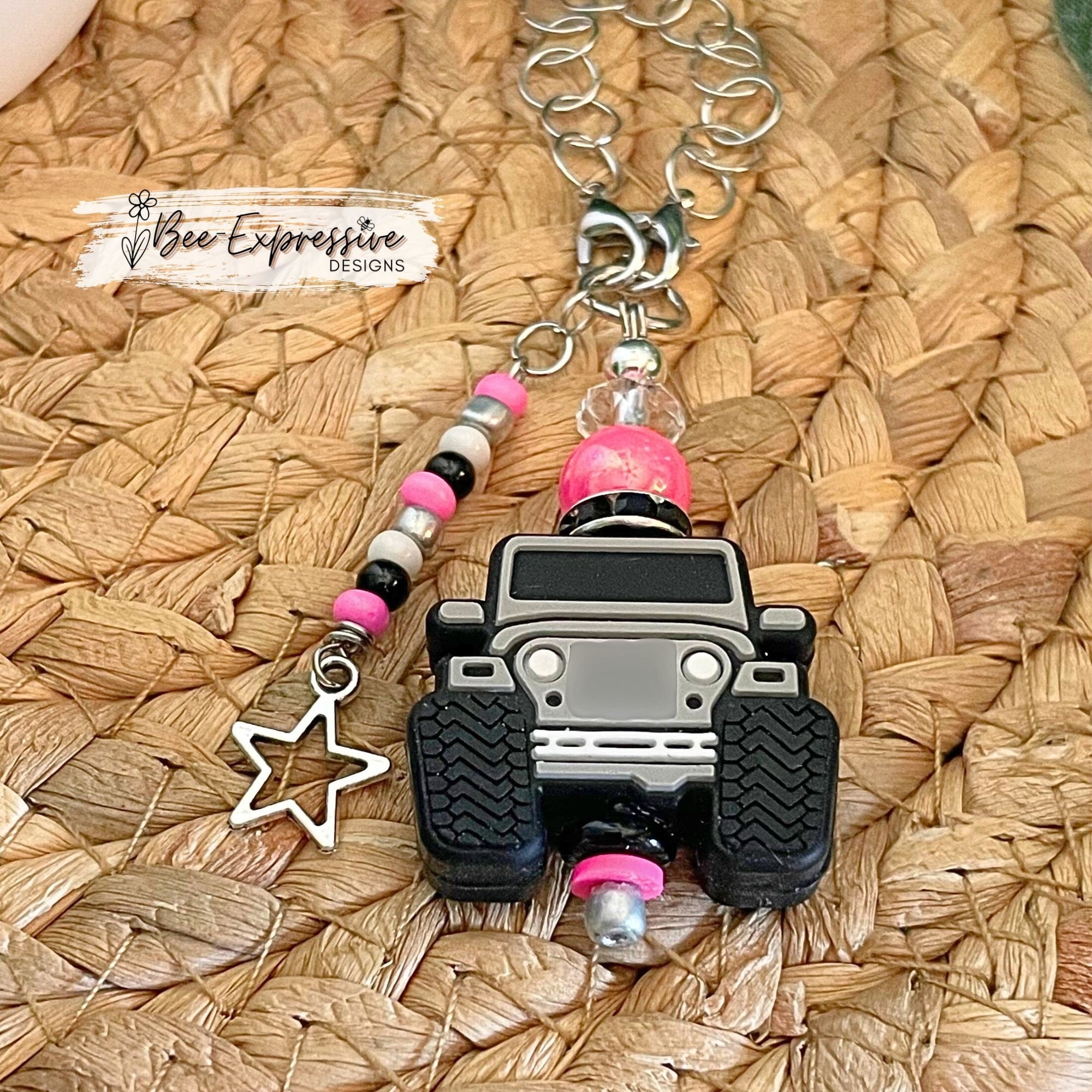 Handmade and fun, a 4x4 vehicle charm chain for tumbler handles!! 2 small lobster claw clasps, acrylic beads, beaded tassel, a star charm!
