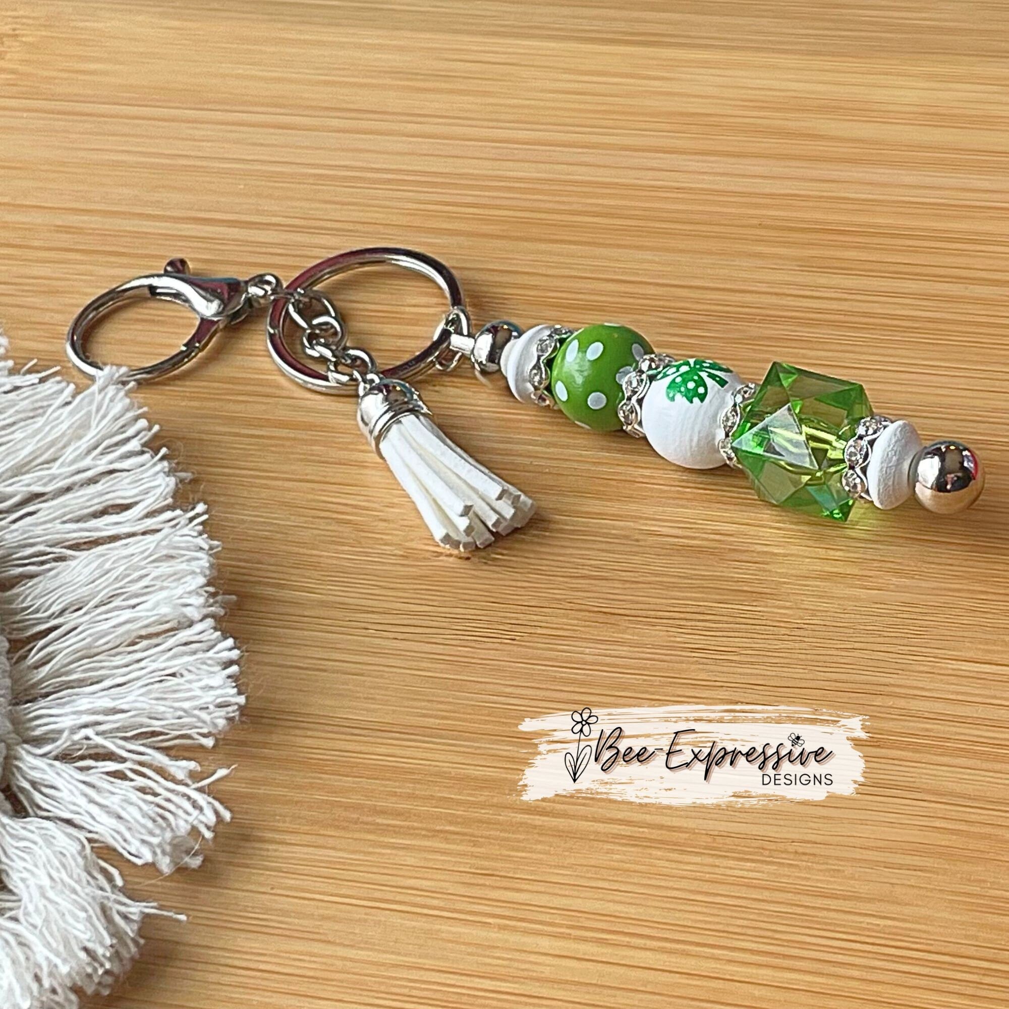Beautiful, handmade shamrock keychain with 20mm acrylic bead! Lobster clasp, metal keychain, rhinestones, polka dot wood bead, tassel