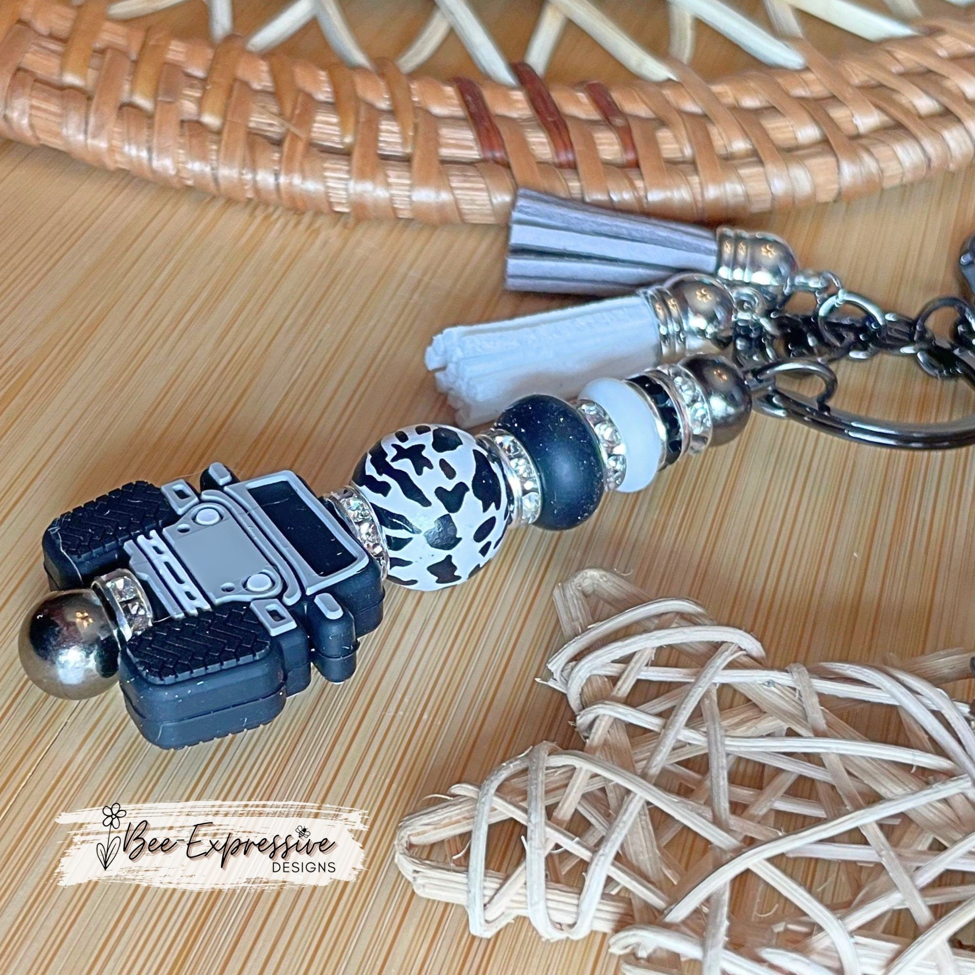 Gray, 4x4 vehicle beaded keychain!  Lobster clasp, keyring, animal print bead, rhinestone spacers, lentil beads & two tassels