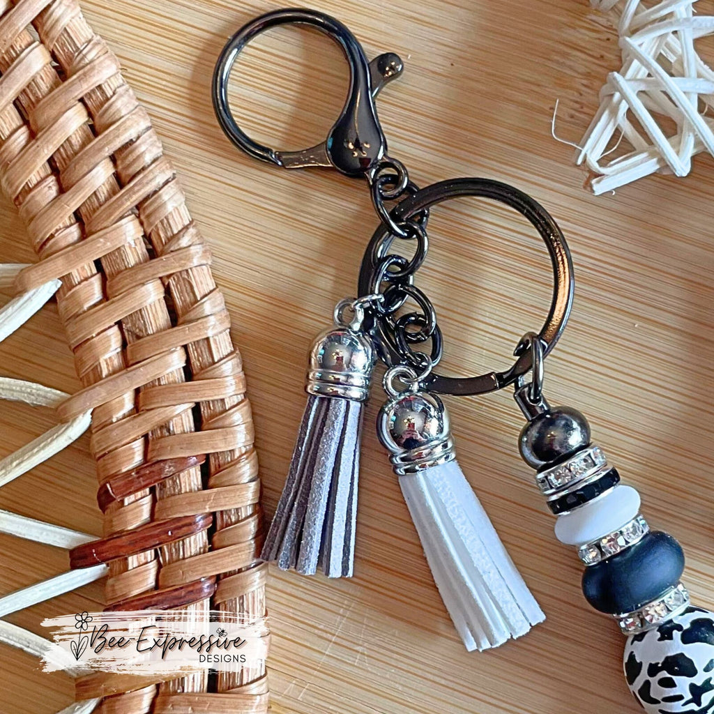 Gray, 4x4 vehicle beaded keychain!  Lobster clasp, keyring, animal print bead, rhinestone spacers, lentil beads & two tassels