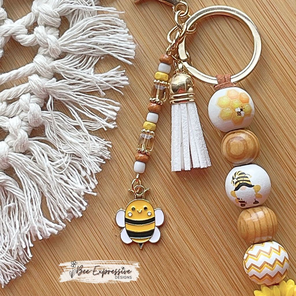 Adorable, handmade BEE gnome keychain! Lobster claw clasp, suede cord, silicone sunflower, printed wood beads, beaded tassel, bee charm!