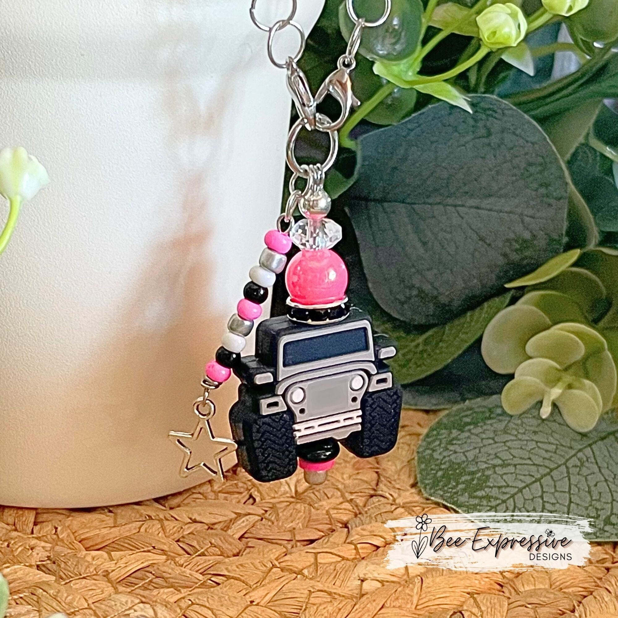 Handmade and fun, a 4x4 vehicle charm chain for tumbler handles!! 2 small lobster claw clasps, acrylic beads, beaded tassel, a star charm!