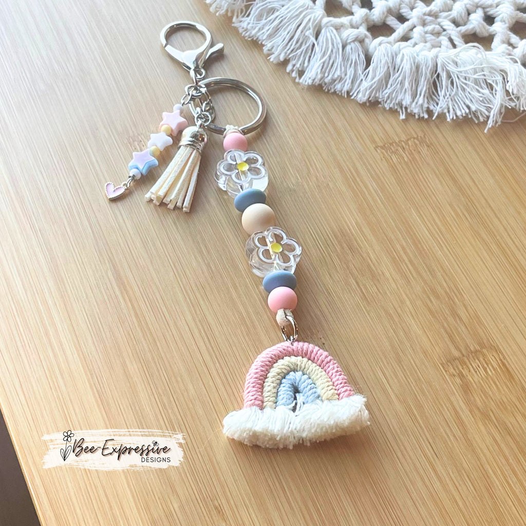 Beaded, rainbow and daisy flower, keychain! Lobster clasp, suede cord, silicone beads, acrylic flowers, beaded star tassel, pink heart charm