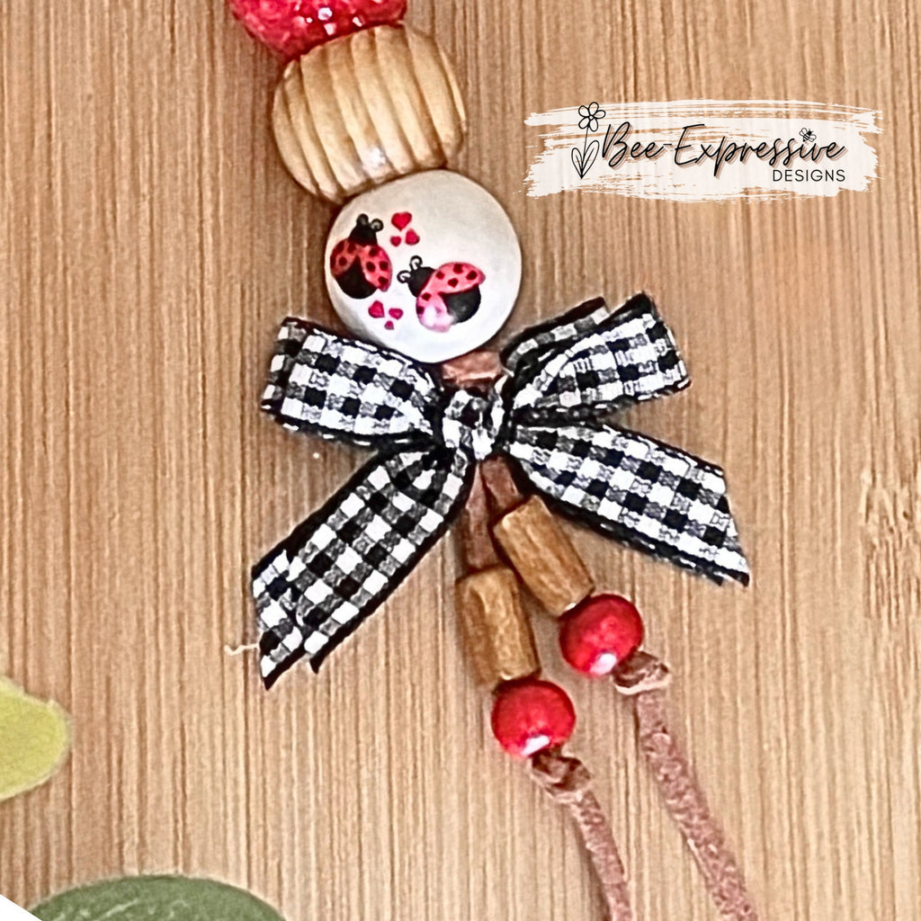 Handmade and unique, chunky bead, lady bug keychain!  Lobster claw clasp, suede cord, 20mm wood and acrylic beads, gingham bow, tassels