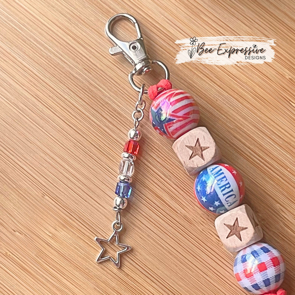 Handmade, unique, USA America keychain! Swivel or lobster clasp, suede cord, iridescent beads, stars, wood squares, beaded tassel star charm