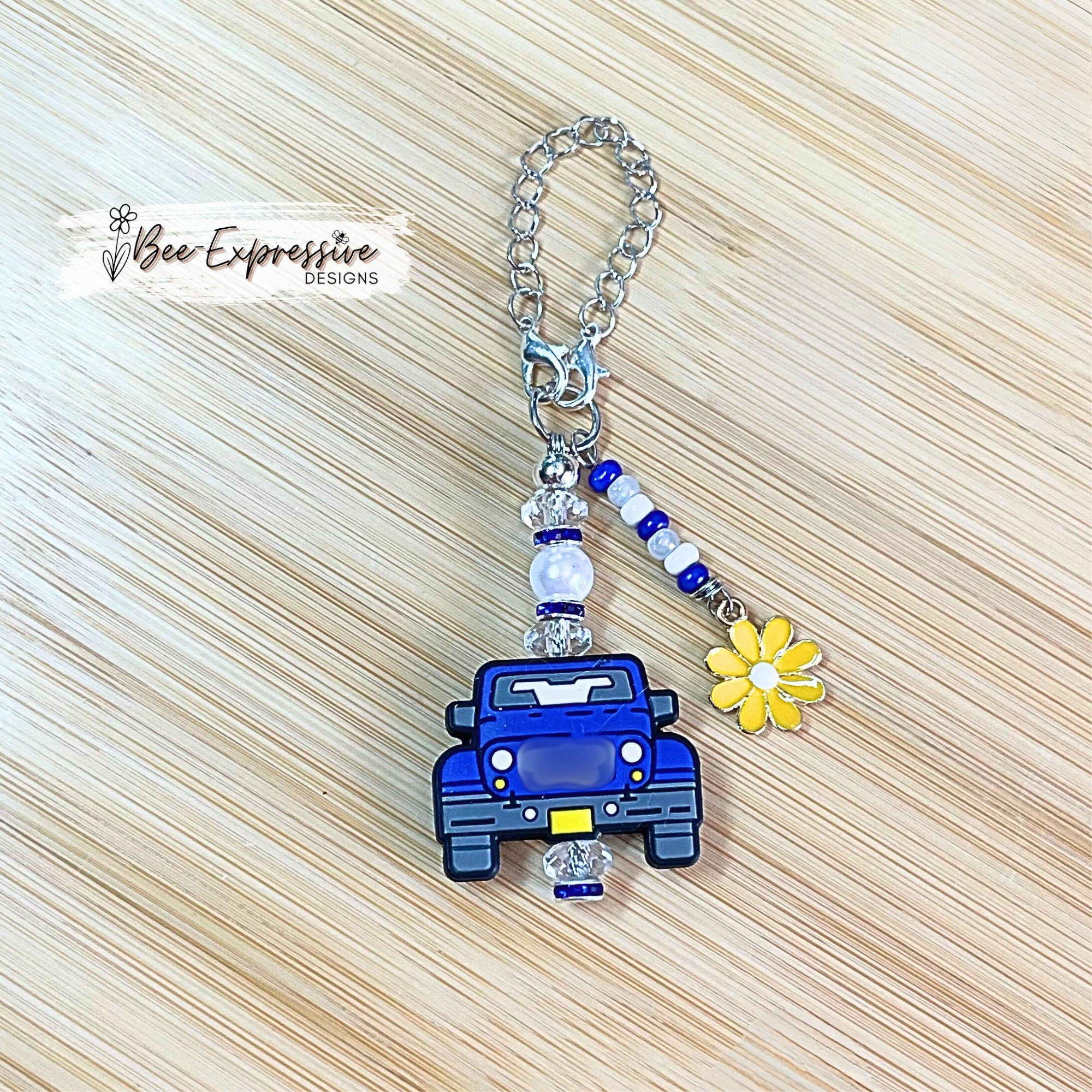 Handmade, blue 4x4 vehicle charm chain for a tumbler! Acrylic beads, lobster claw clasps, rhinestones, beaded tassel, yellow metal charm!