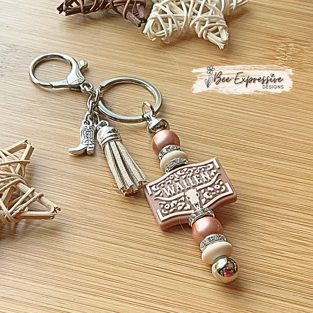 Beaded WALLEN keychain! Lobster or swivel clasp, shiny silicone beads, rhinestone spacers, a metal boot charm, and a suede tassel!