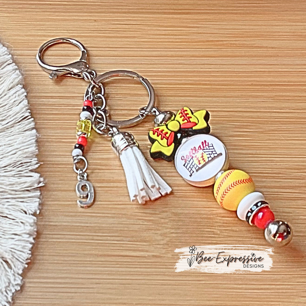 Handmade, softball mom, keychain! Lobster claw or swivel clasp, softball bow & ball, rhinestone spacer, acrylic beaded tassel with jersey #!