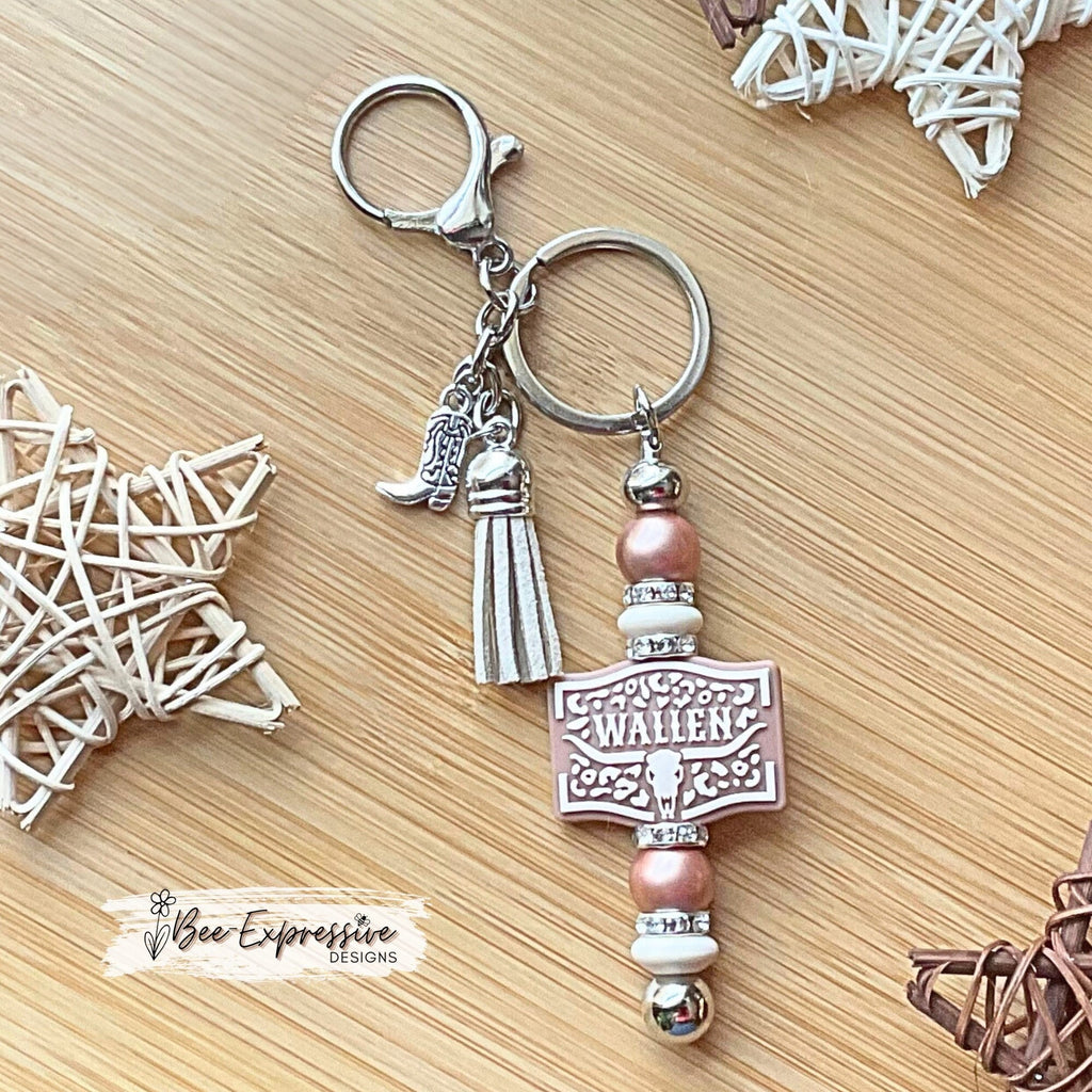 Beaded WALLEN keychain! Lobster or swivel clasp, shiny silicone beads, rhinestone spacers, a metal boot charm, and a suede tassel!