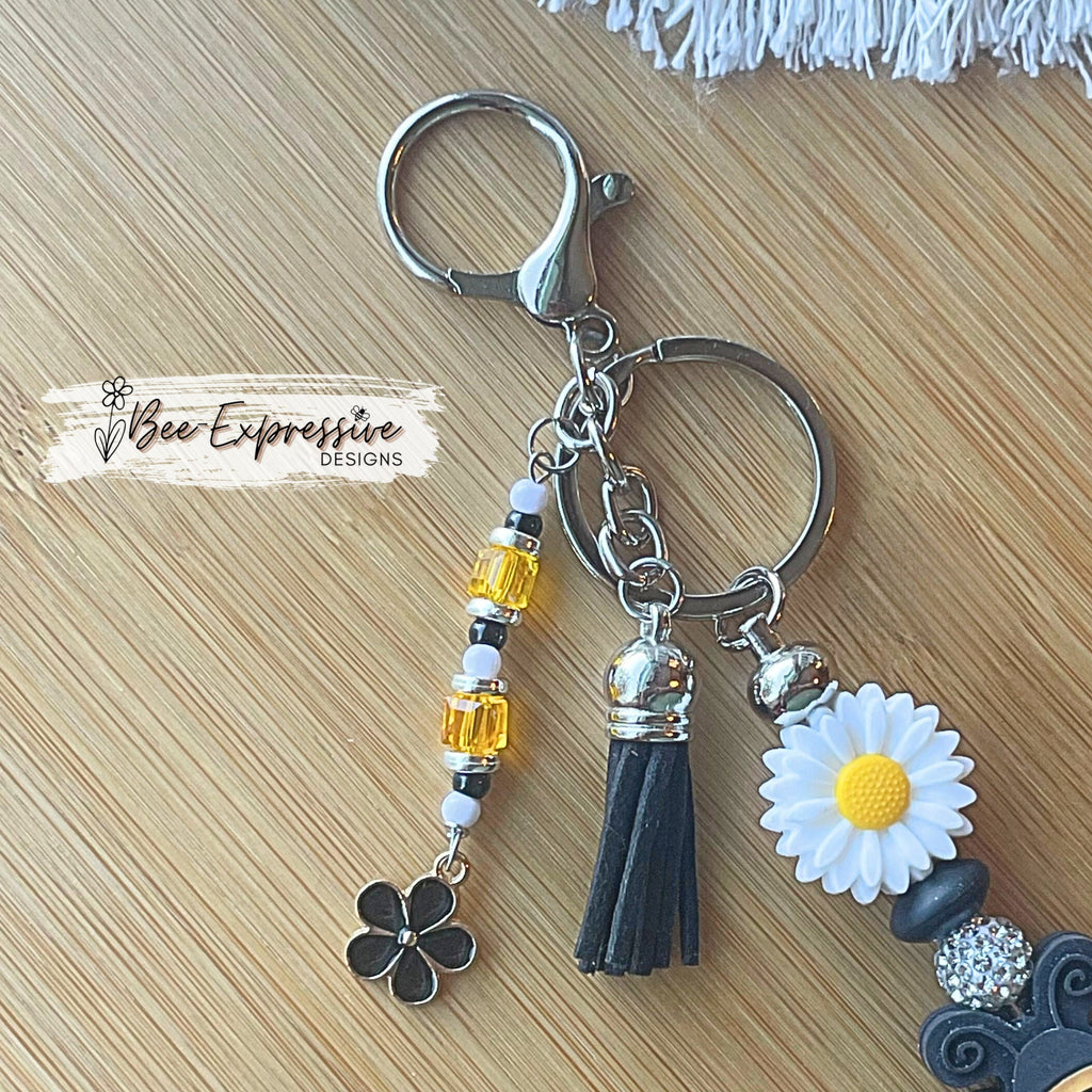 Handmade, bright and colorful, silicone daisy flower &  bumble bee keychain! Lobster clasp, beaded tassel, black flower charm, suede tassel