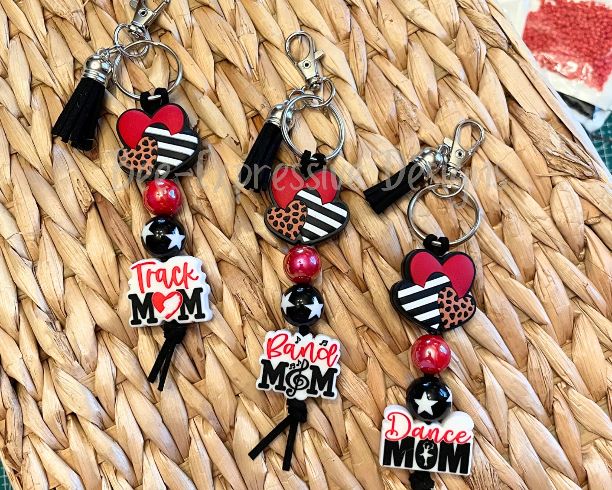 Handmade, unique, Track Mom, Band Mom, or Dance Mom keychain! Swivel clasp, keyring, suede cord, star bead, silicone hearts & focal, tassel